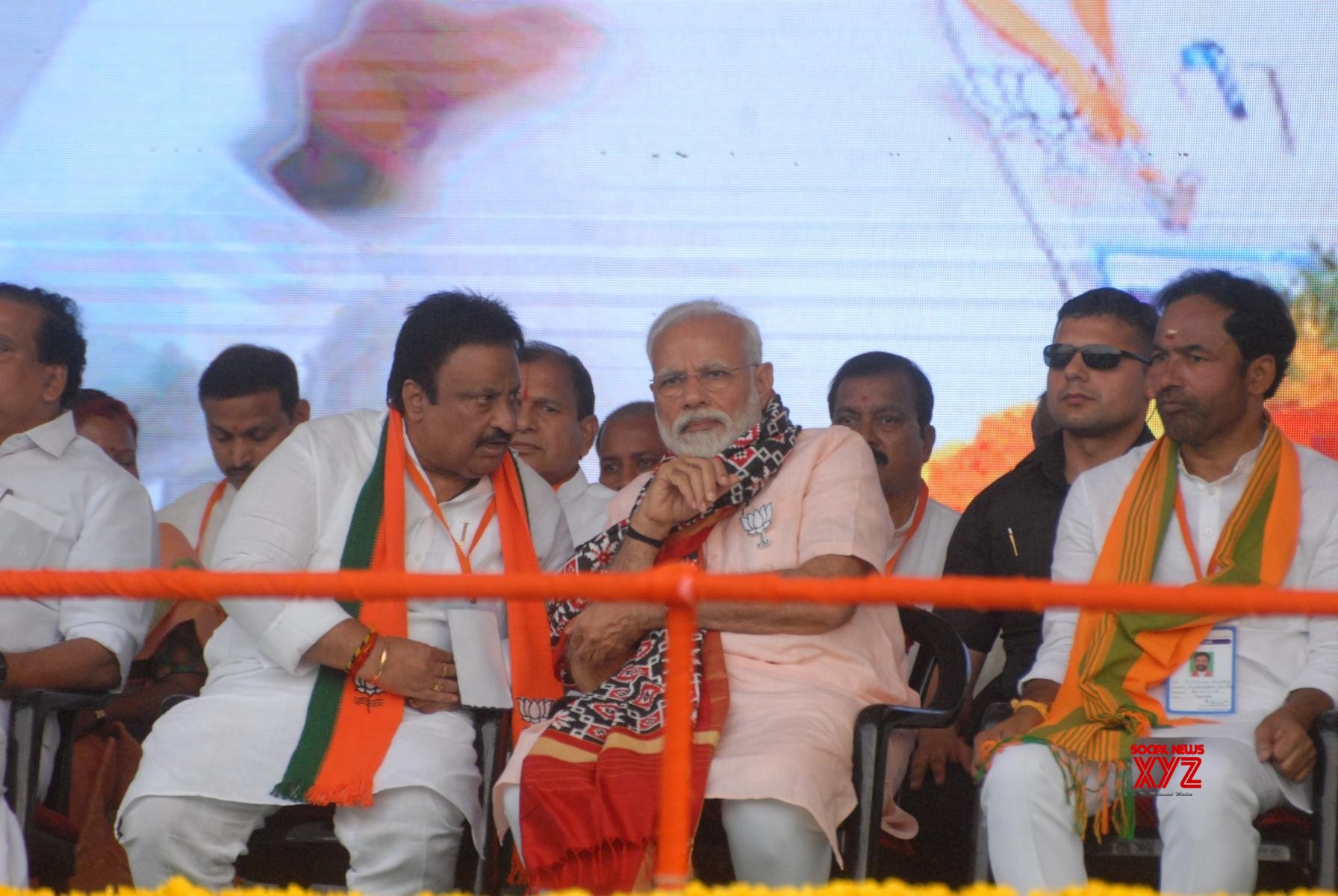 Rajahmundry: Prime Minister and BJP leader Narendra Modi with party leaders A. P. Jithender Reddy and K. Laxman during an election rally ahead of 2019 Lok Sabha election in Andhra Pradesh's Rajahmundry, on April 1, 2019. (Photo: IANS)
