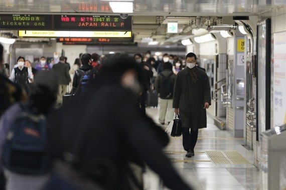 Japan's economy shrinks 4.8% due to Covid in 2020 Japan's economy shrinks 4.8% due to Covid in 2020
