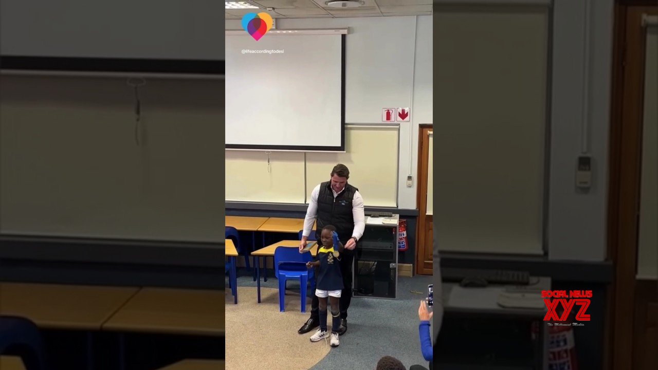 Second grader introduces his godfather and Olympic swimmer, Lyndon Ferns, to his class #shorts (Video)