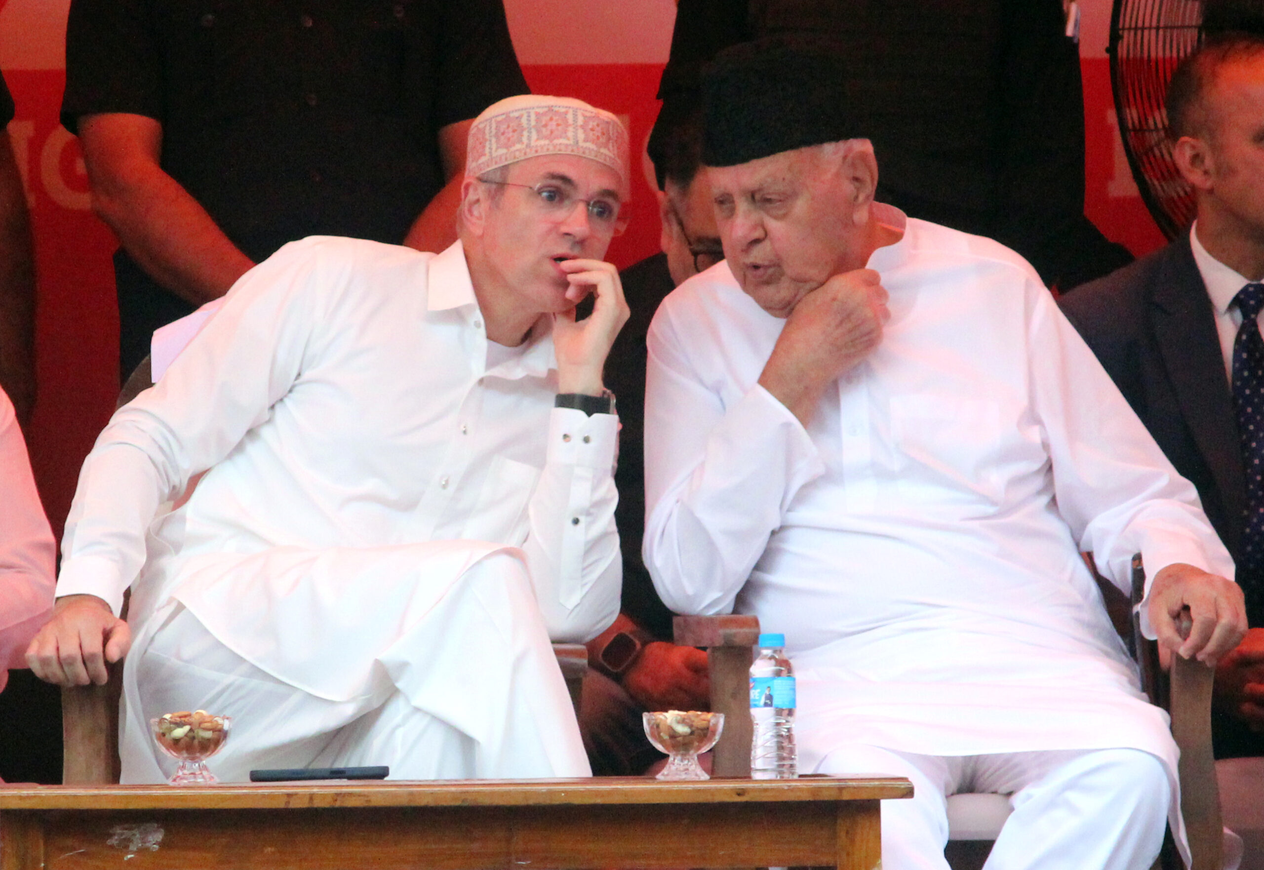 Srinagar: Jammu and Kashmir National Conference President Farooq Abdullah and Jammu and Kashmir Chief Minister Omar Abdullah, attend a tribute programme marking the 26th death anniversary of Begum Akbar Jehan Abdullah, revered as "Madar-e-Meherbaan", at Naseem Bagh in Hazratbal, Srinagar, on Saturday, July 11, 2026. (Photo: IANS)