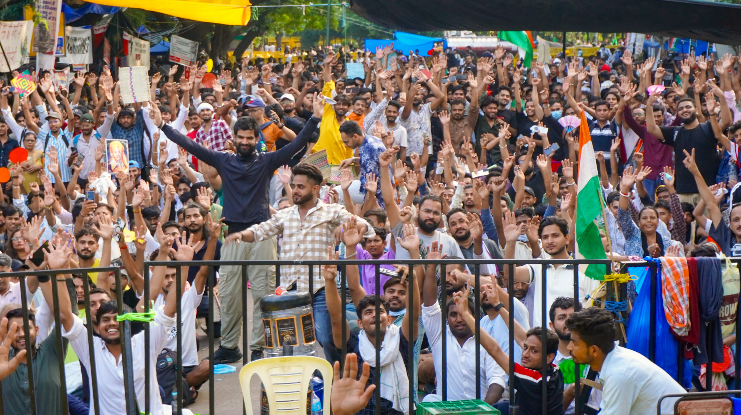 New Delhi: Supporters of the Cockroach Janta Party (CJP) during the ongoing protest demanding the resignation of Union Education Minister Dharmendra Pradhan over alleged examination irregularities at Jantar Mantar in New Delhi on Thursday, July 23, 2026. (Photo: IANS)