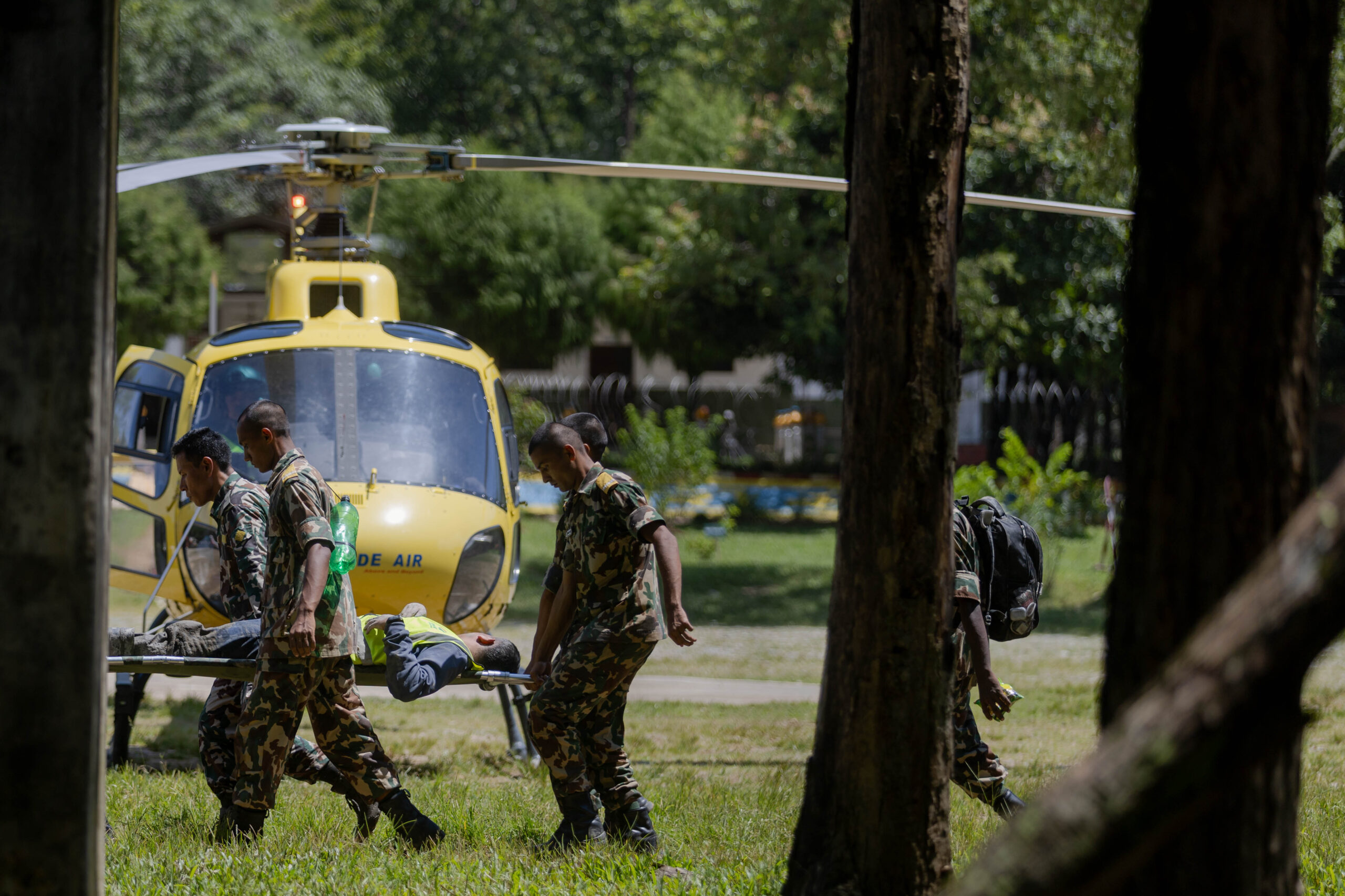 Nuwakot: Soldiers transfer an injured person after a massive flash flood in Nuwakot, Nepal, on Aug. 27, 2026. Nepal's National Disaster Risk Reduction Management Authority said that as many as 359 bodies had been recovered from flood-hit areas by Thursday evening, with 910 people still missing. (Photo: Xinhua via IANS)