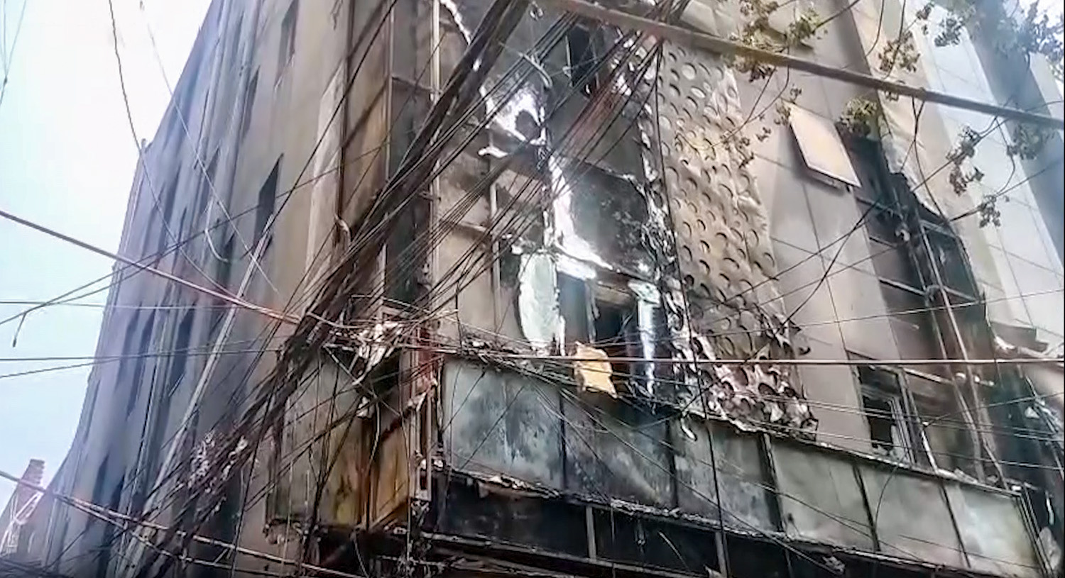 New Delhi: Charred remains of a restaurant where a fire broke out in the Malviya Nagar area of New Delhi on Wednesday, June 03, 2026. (Photo: IANS/Video Grab)