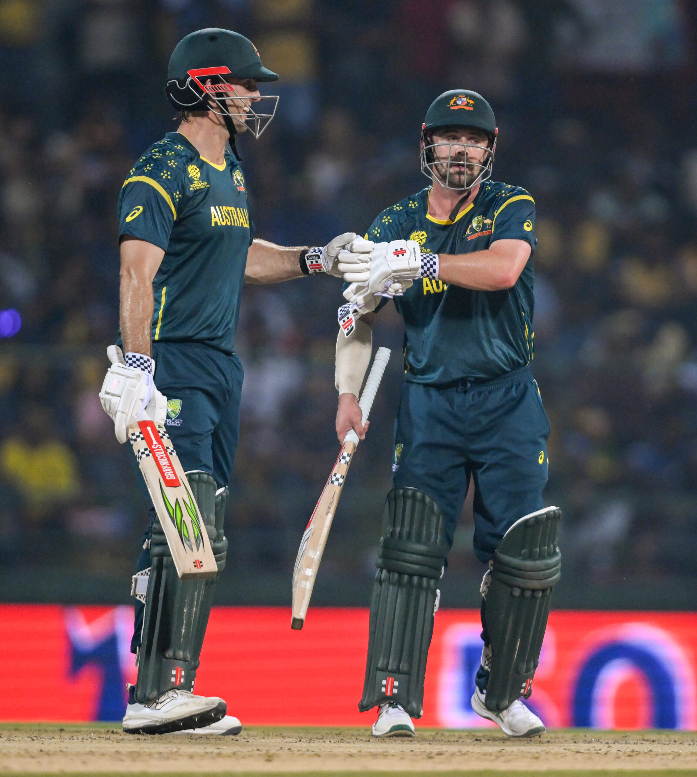 Pallekele: Australia's captain Mitchell Marsh and player Travis Head celebrate their partnership during the ICC Men's T20 World Cup 2026 match between Australia and Sri Lanka at Pallekele International Cricket Stadium in Pallekele on Monday, February 16, 2026. (IANS/Biplab Banerjee)