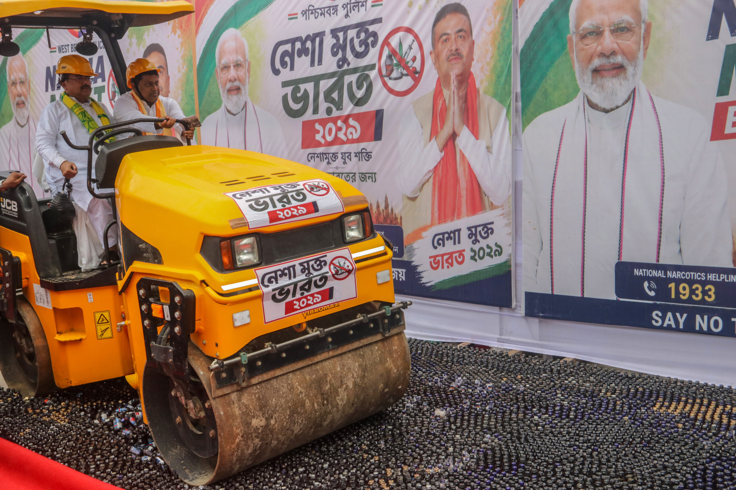 Dakshin Dinajpur: West Bengal Chief Minister Suvendu Adhikari and Union Minister of State Sukanta Majumdar operate a bulldozer during the ceremonial destruction of seized illegal drugs under the West Bengal Police's 'Nasha Mukt Bharat 2029' initiative at Balurghat in Dakshin Dinajpur district, West Bengal, on Wednesday, September 02, 2026. (Photo: IANS)
