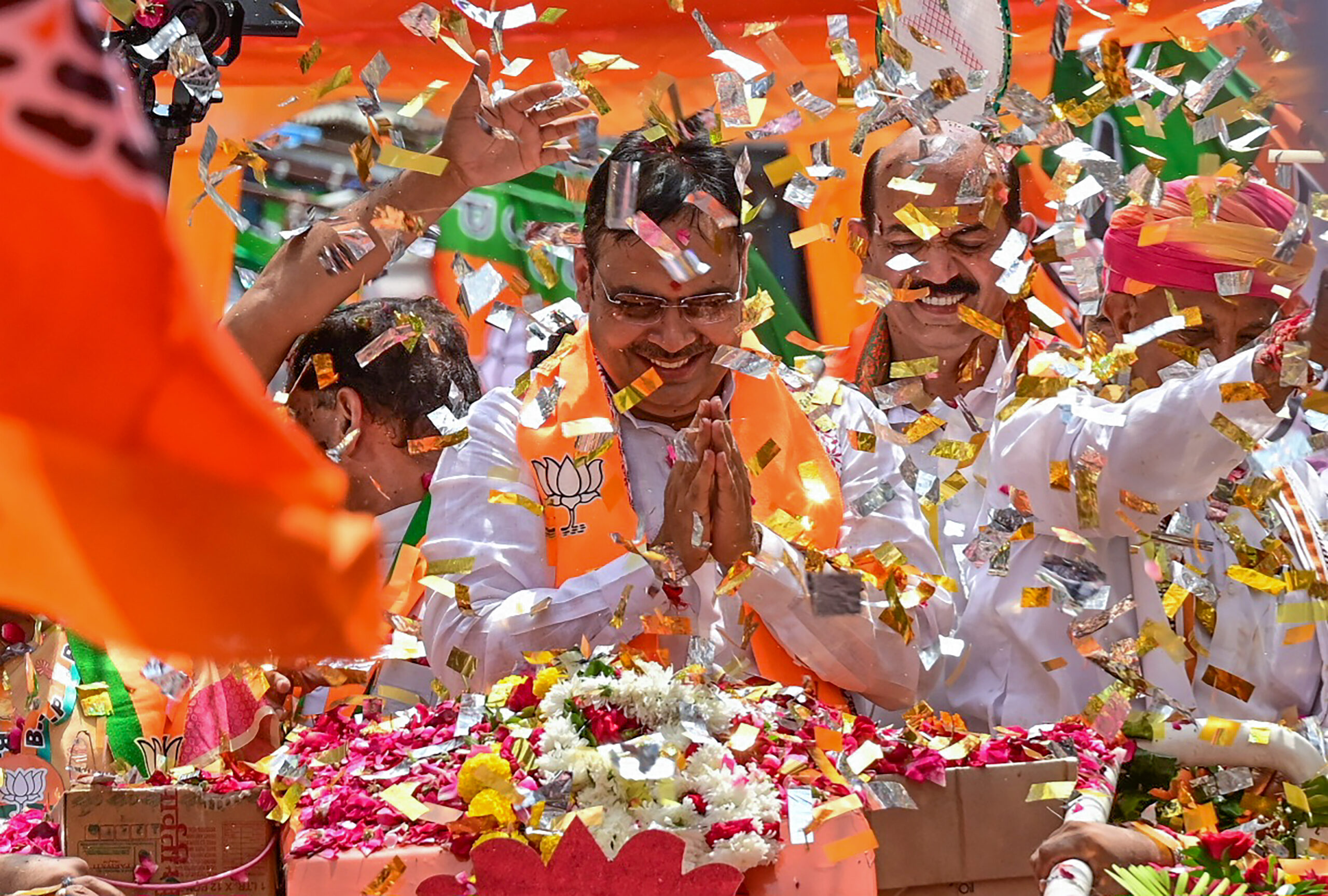 Ajmer: Rajasthan Chief Minister Bhajanlal Sharma greets supporters during a roadshow ahead of the upcoming Municipal Corporation elections in Ajmer, Rajasthan, on Sunday, September 6, 2026. (Photo: IANS)