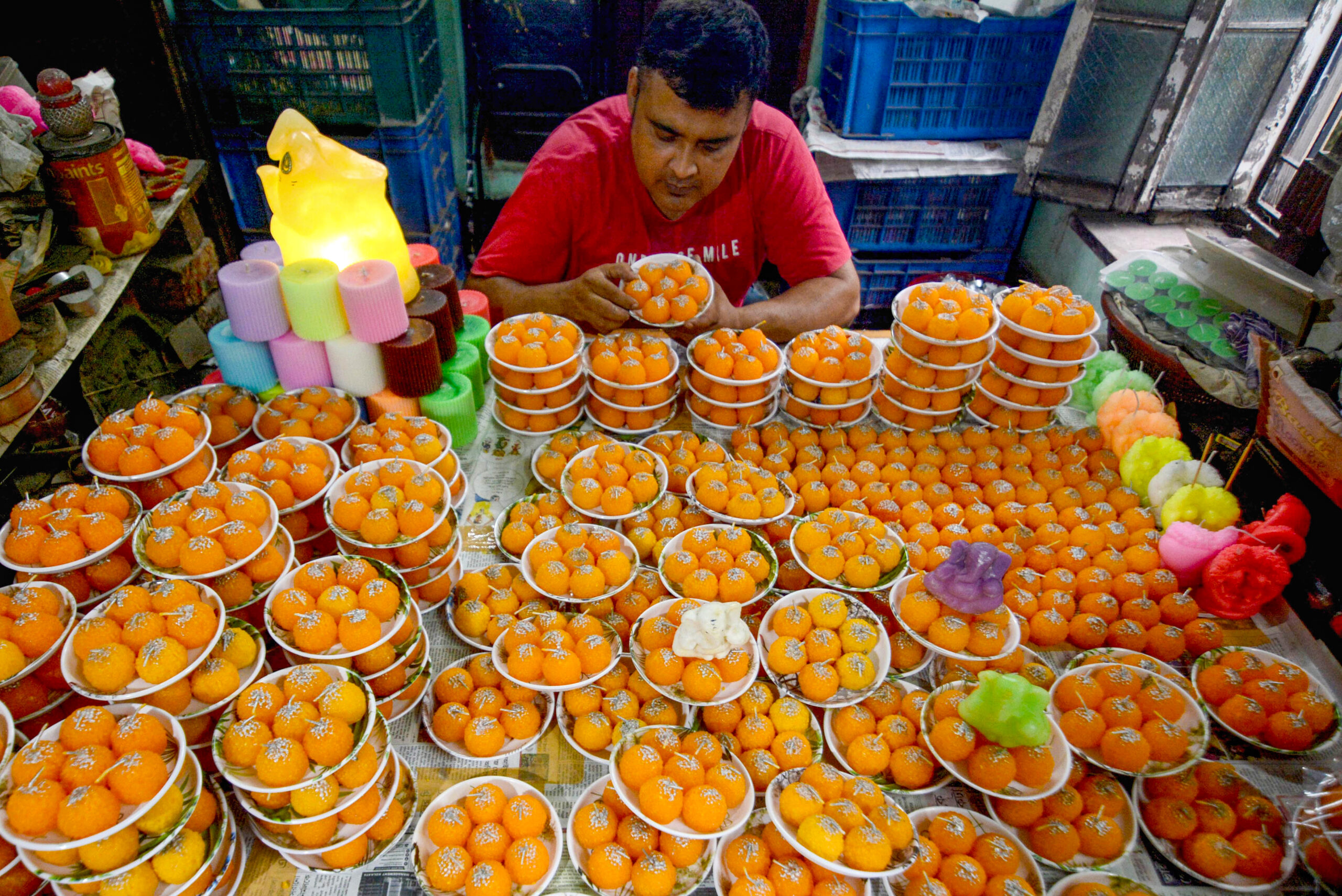 Kolkata: Laddoo Shaped Candles Ahead of Ganesh Chaturthi #Gallery Kolkata: Laddoo Shaped Candles Ahead of Ganesh Chaturthi #Gallery