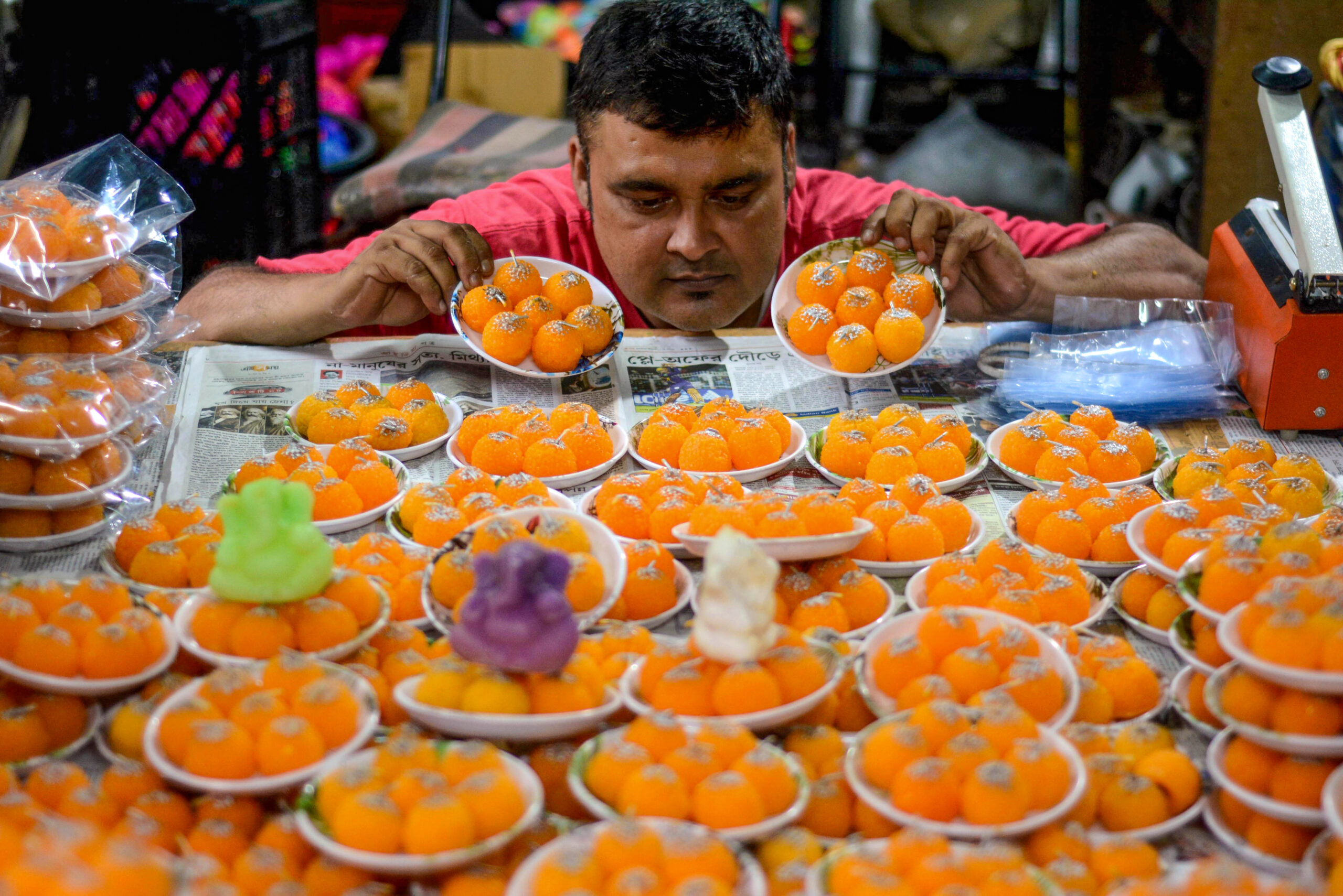 Kolkata: Laddoo Shaped Candles Ahead of Ganesh Chaturthi #Gallery Kolkata: Laddoo Shaped Candles Ahead of Ganesh Chaturthi #Gallery