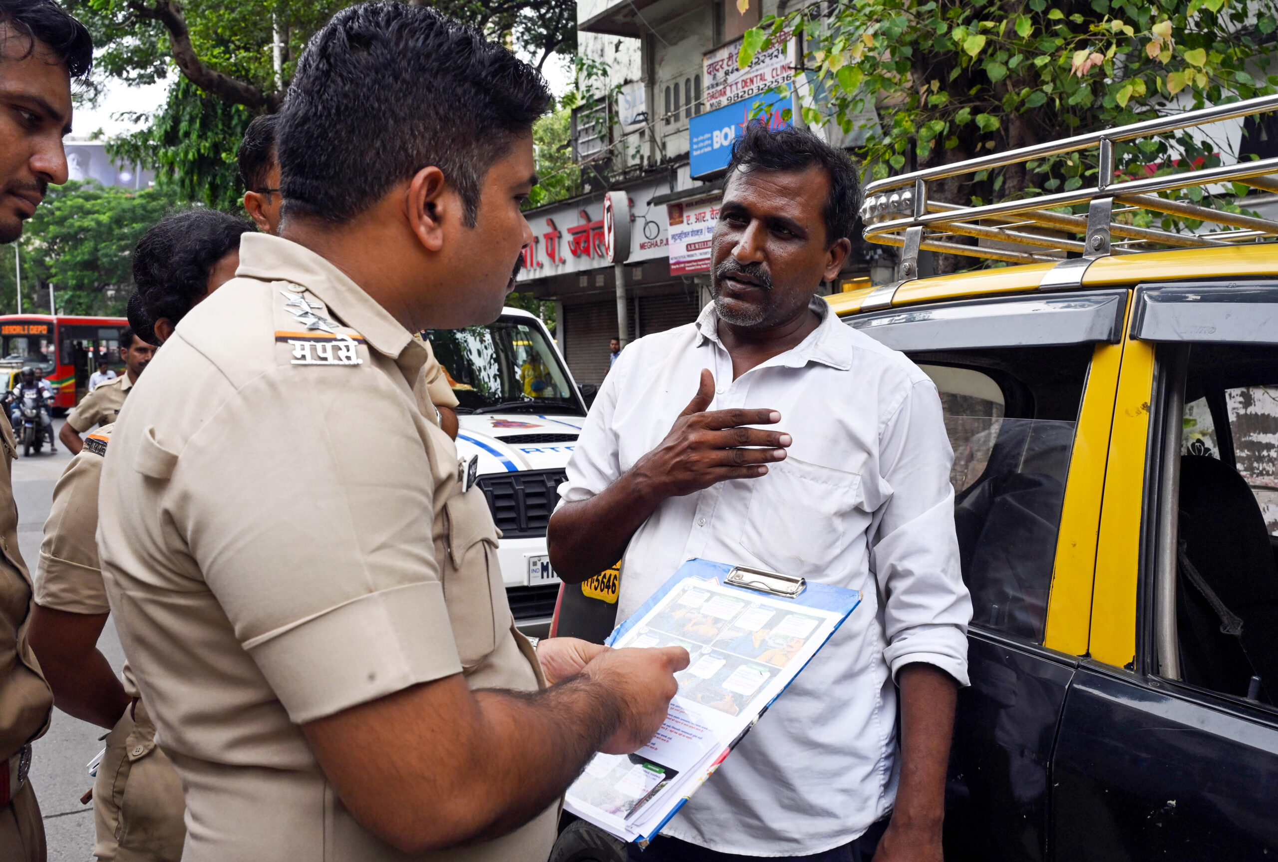 Mumbai: RTO flying squad personnel check taxi drivers near Dadar Railway Station following the Maharashtra government’s directive requiring commercial passenger vehicle drivers to have working knowledge of Marathi, in Mumbai, Maharashtra on Thursday, August 20, 2026. (Photo: IANS)