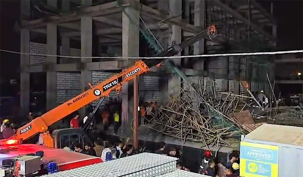Gandhinagar: A rescue operation is underway after a portion of an under-construction building collapsed in the Kudasan area of Gandhinagar, Gujarat, on Wednesday, September 9, 2026. Some people are feared trapped under the debris, while around 10 injured people are admitted to Civil Hospital for treatment. (Photo: IANS/Video Grab)