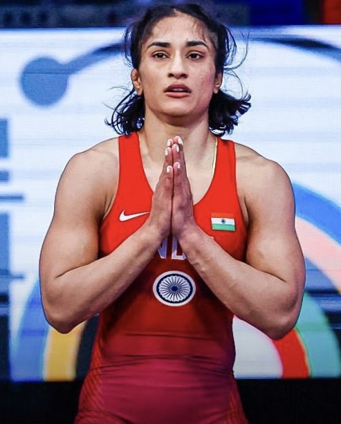 India's Vinesh Vinesh celebrates after defeating Cuba's Yusneylys Guzman during their women's freestyle 50kg wrestling semifinal match, at Champ-de-Mars Arena, during the 2024 Summer Olympics, Tuesday, Aug. 6, 2024. (IANS/WFI)