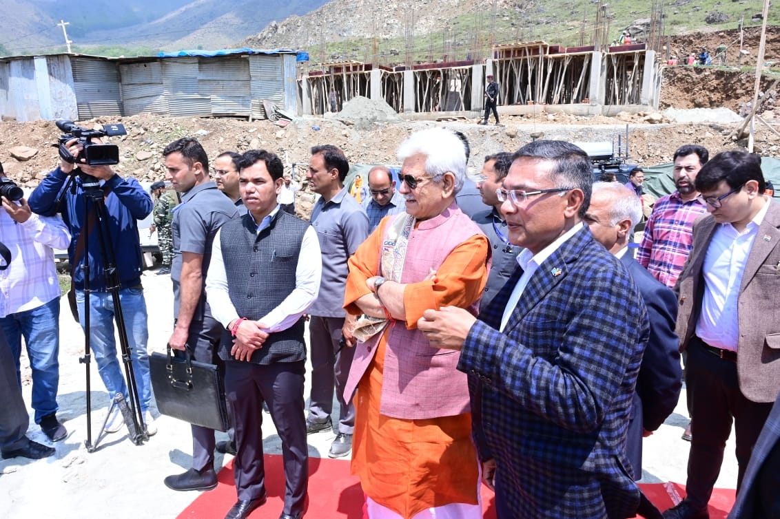 Srinagar : Jammu and Kashmir Lieutenant Governor Manoj Sinha conducted on-site inspection and reviewed ongoing construction work of the transit accommodation for PM Package employees at Zewan in Srinagar on Sunday, May 14, 2023. (Photo:IANS)