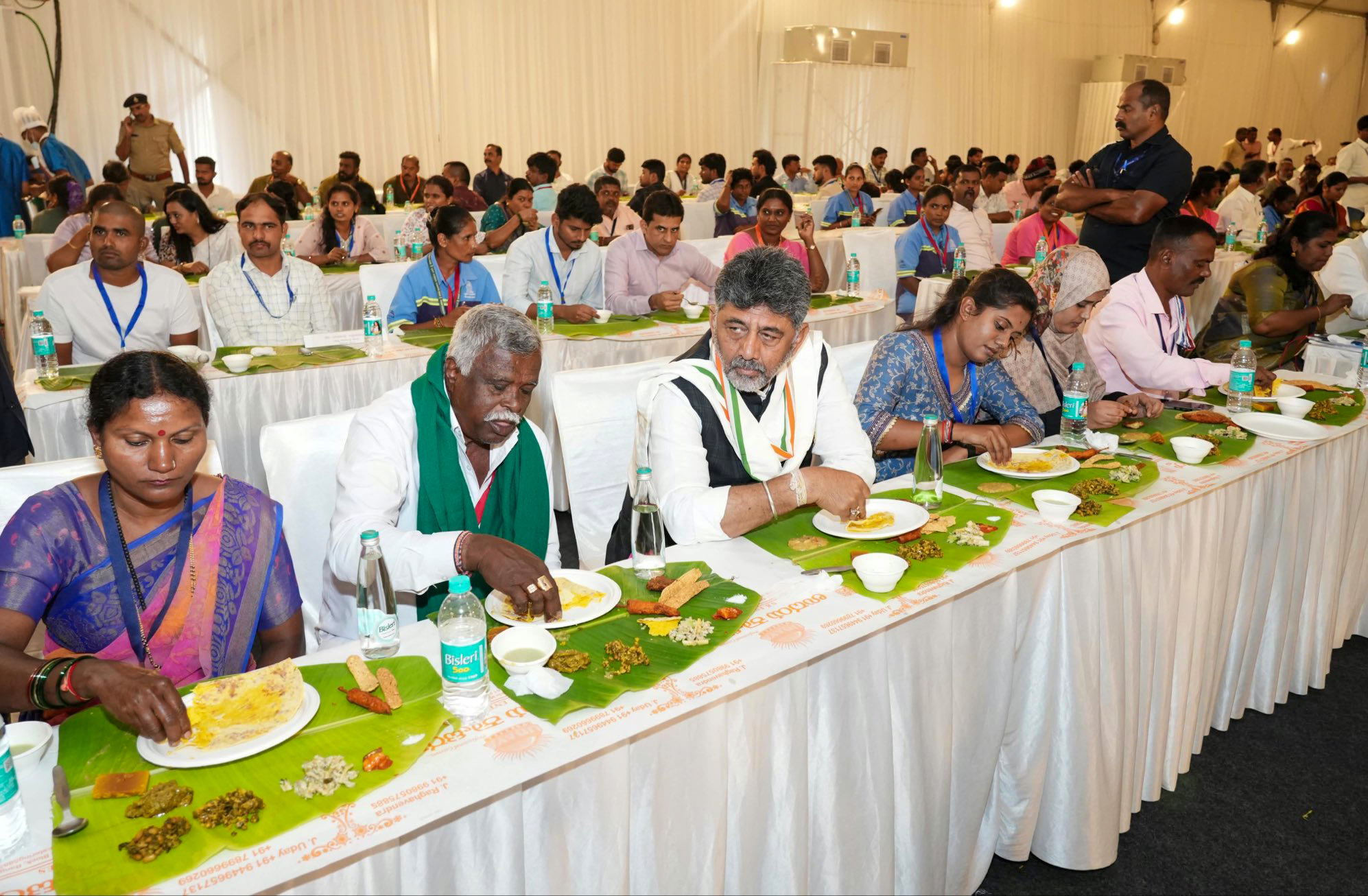 Bengaluru: D.K. Shivakumar Shares Meal with Beneficiaries #Gallery Bengaluru: D.K. Shivakumar Shares Meal with Beneficiaries #Gallery