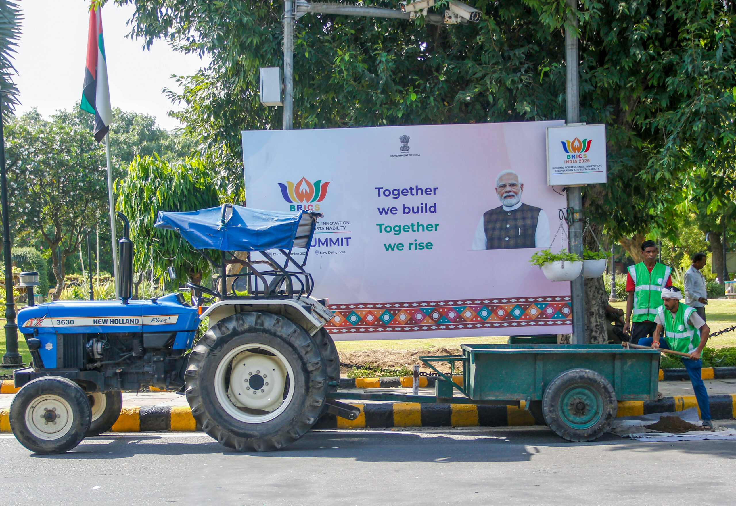 New Delhi: Workers clear a road as preparations are underway ahead of the BRICS India Summit 2026, in New Delhi on Thursday, September 10, 2026. (Photo: IANS/Wasim Sarvar)