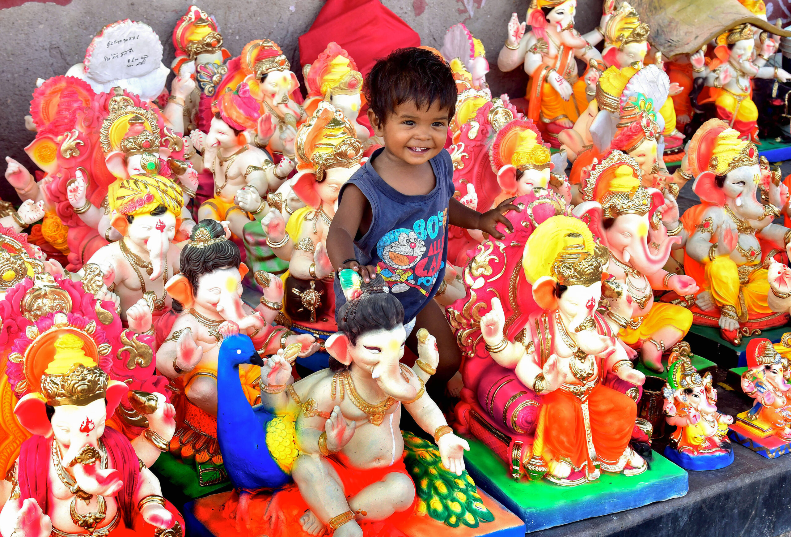 Bikaner Child Stands Among Colourful Lord Ganesha Idols Ahead Of 