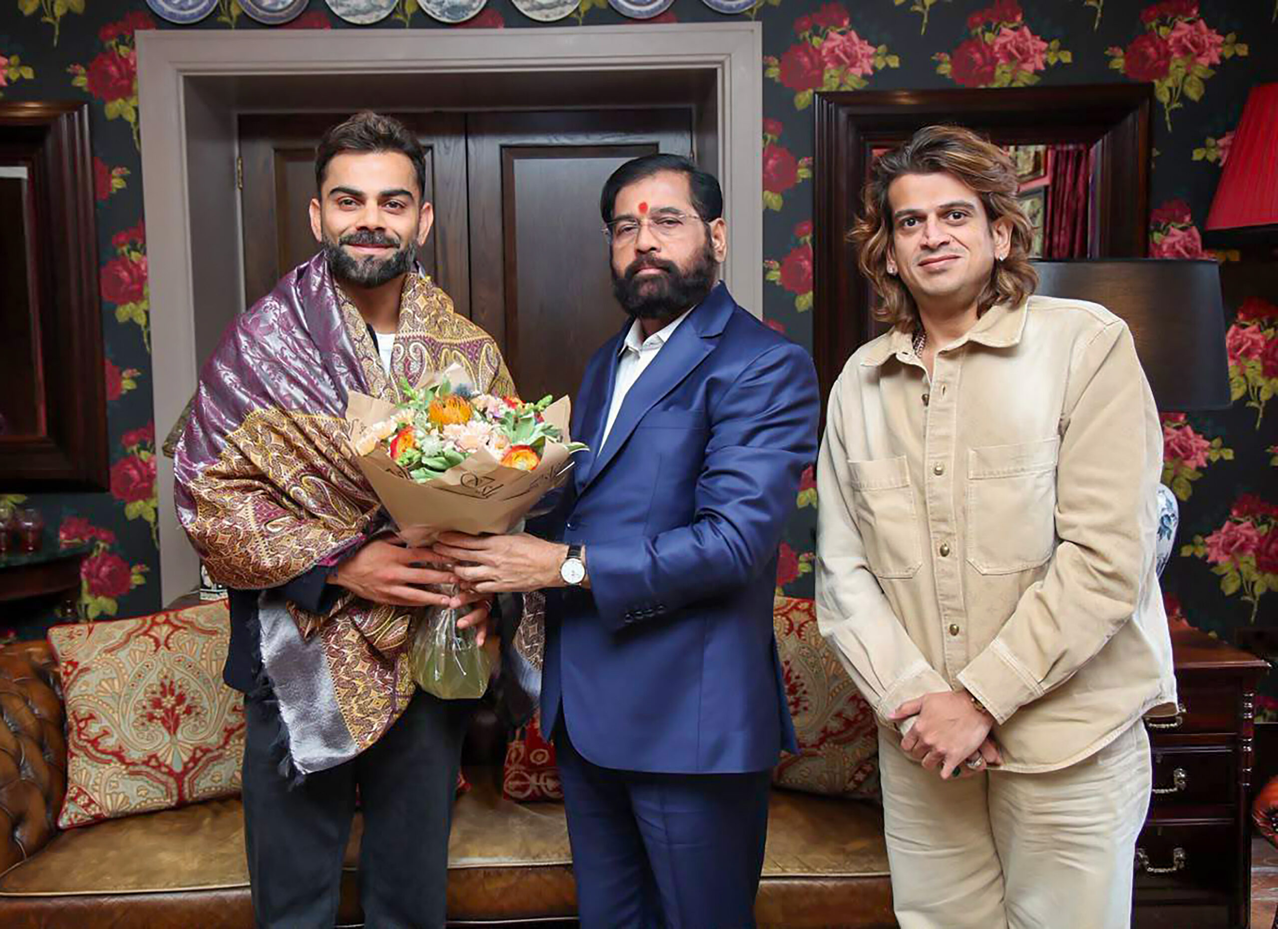 London: Maharashtra Deputy Chief Minister Eknath Shinde meets cricketer Virat Kohli in London, United Kingdom, on Friday, September 11, 2026. Rahool Kanal, General Secretary of Yuva Sena, is also seen in the picture. (Photo: IANS/X/@mieknathshinde)