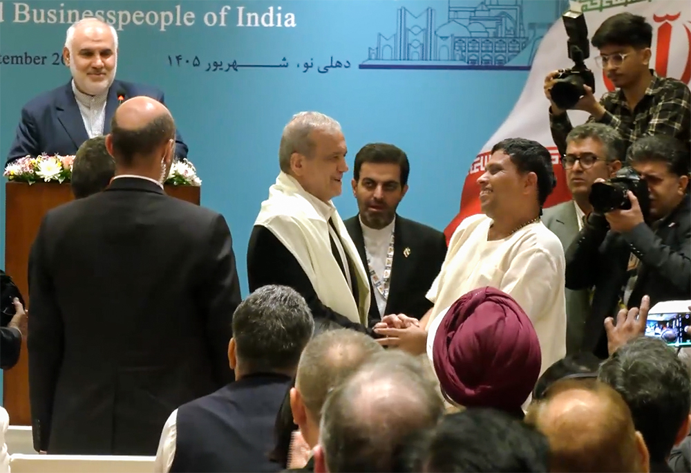 New Delhi: Patanjali Ayurved Managing Director Acharya Balkrishna felicitates President of the Islamic Republic of Iran Masoud Pezeshkian in New Delhi on Friday, September 11, 2026. (Photo: IANS/Video Grab)