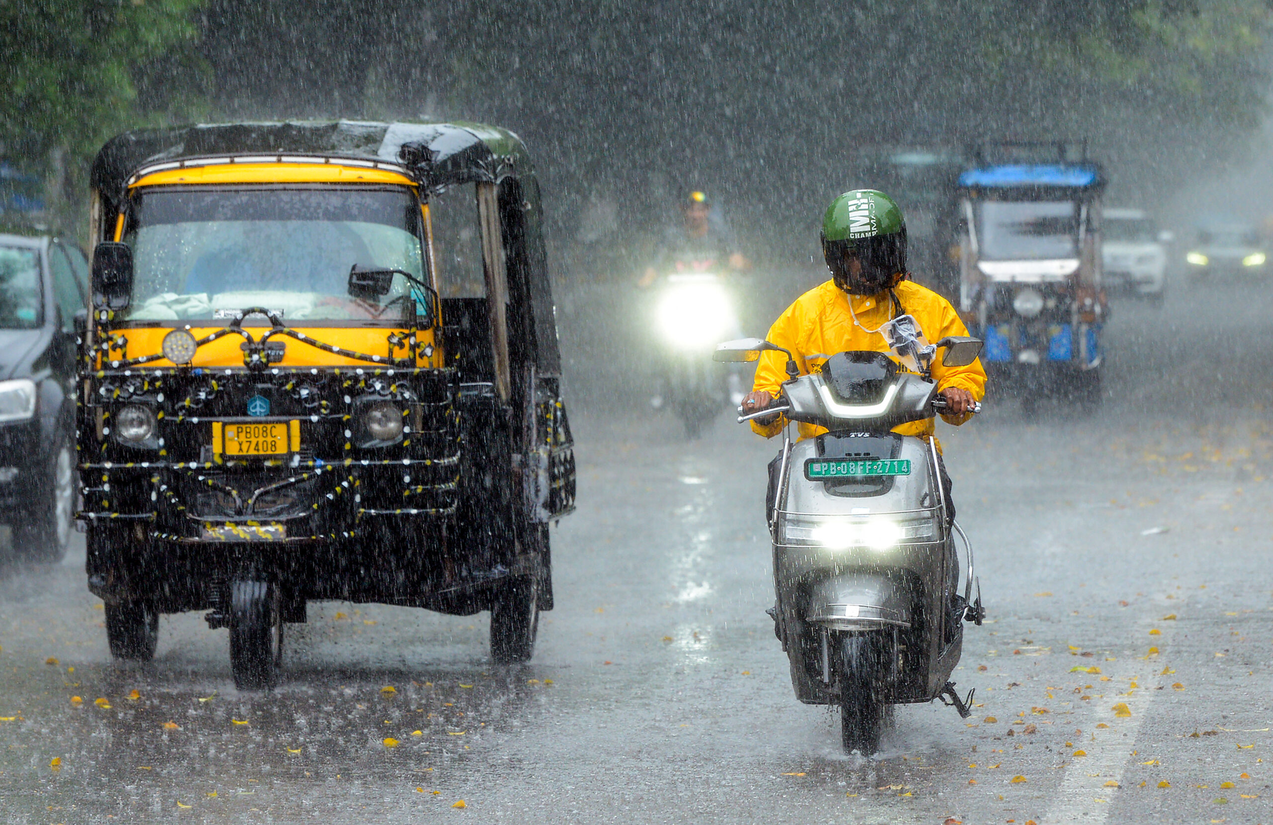 Jalandhar: Vehicles move along a road amid heavy rainfall in Jalandhar, Punjab, on Saturday, September 12, 2026. (Photo: IANS)