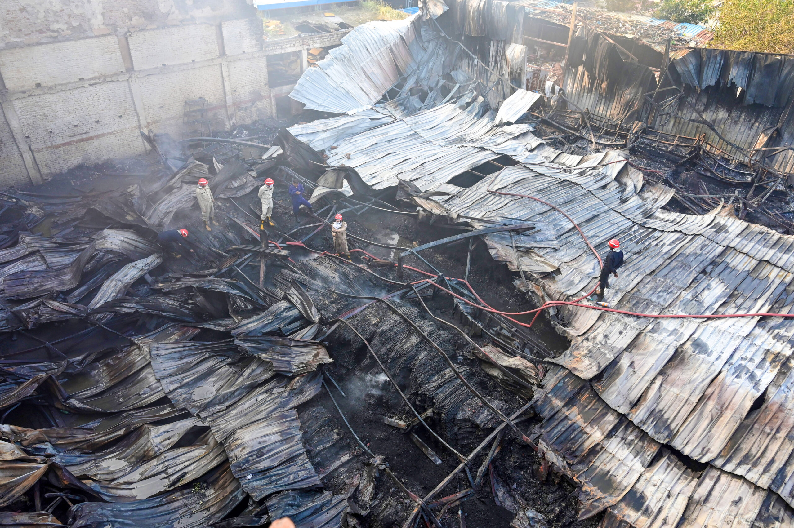 New Delhi: Firefighting operation continues at Dallupura warehouse #Gallery New Delhi: Firefighting operation continues at Dallupura warehouse #Gallery