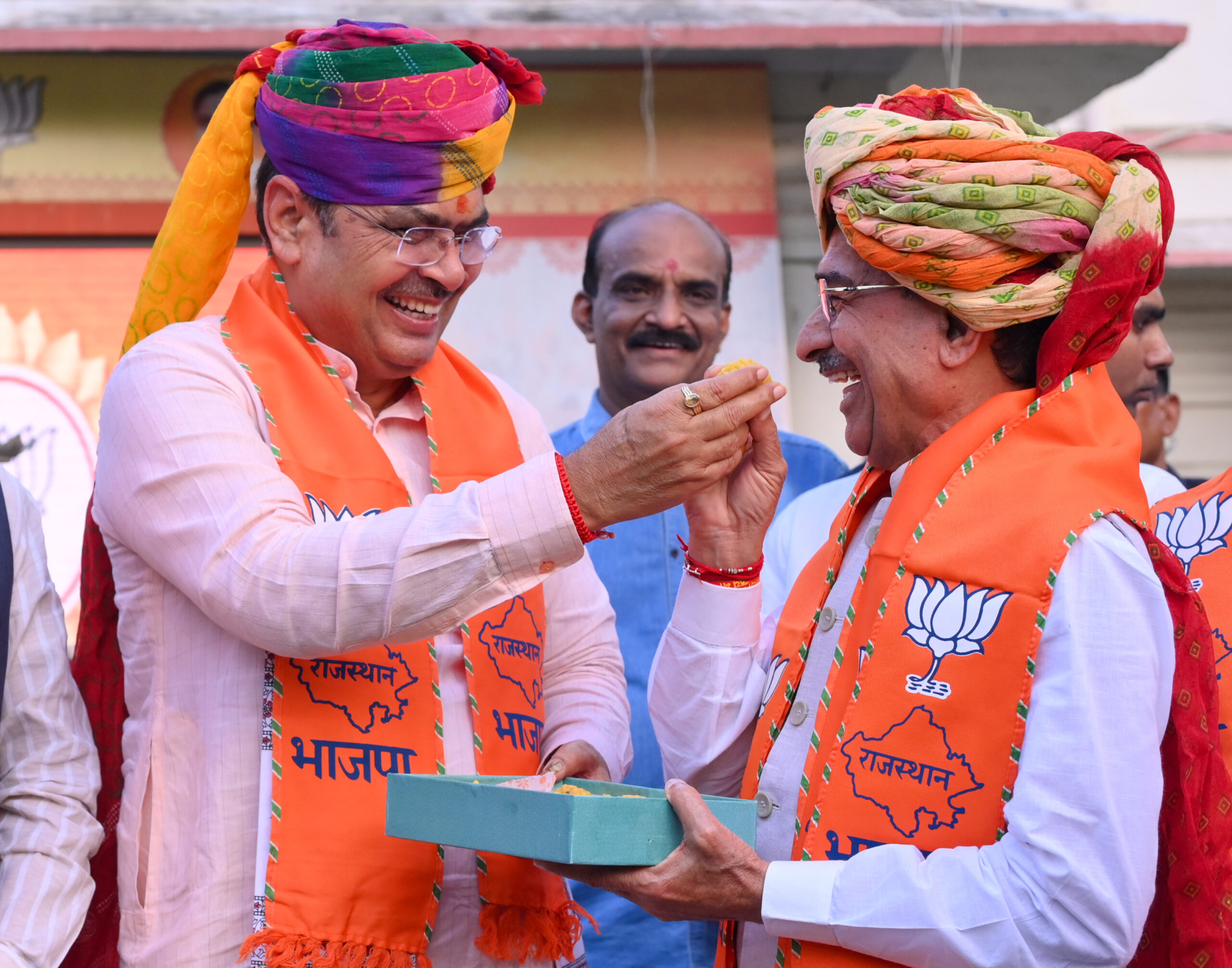 Jaipur: Rajasthan Chief Minister Bhajanlal Sharma offers sweets to Rajasthan Bharatiya Janata Party (BJP) President Madan Rathore after the party's victory in the state local body elections at the BJP headquarters in Jaipur on Monday, September 14, 2026. (Photo: IANS)