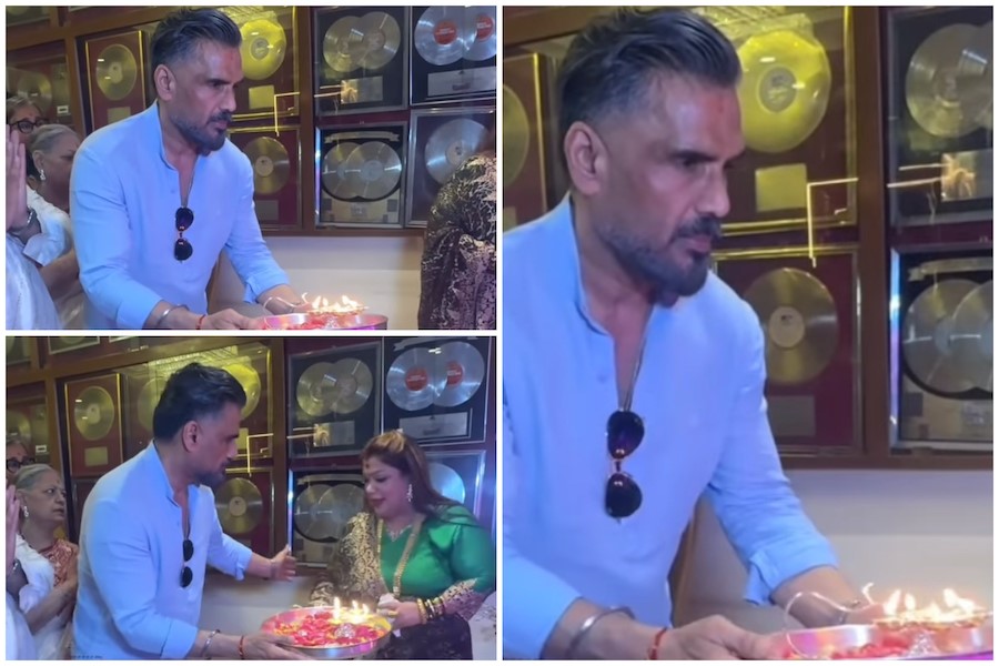 Suniel Shetty Visits Bappi Lahiri's Mumbai Home for Ganesh Chaturthi Celebrations Suniel Shetty Visits Bappi Lahiri's Mumbai Home for Ganesh Chaturthi Celebrations