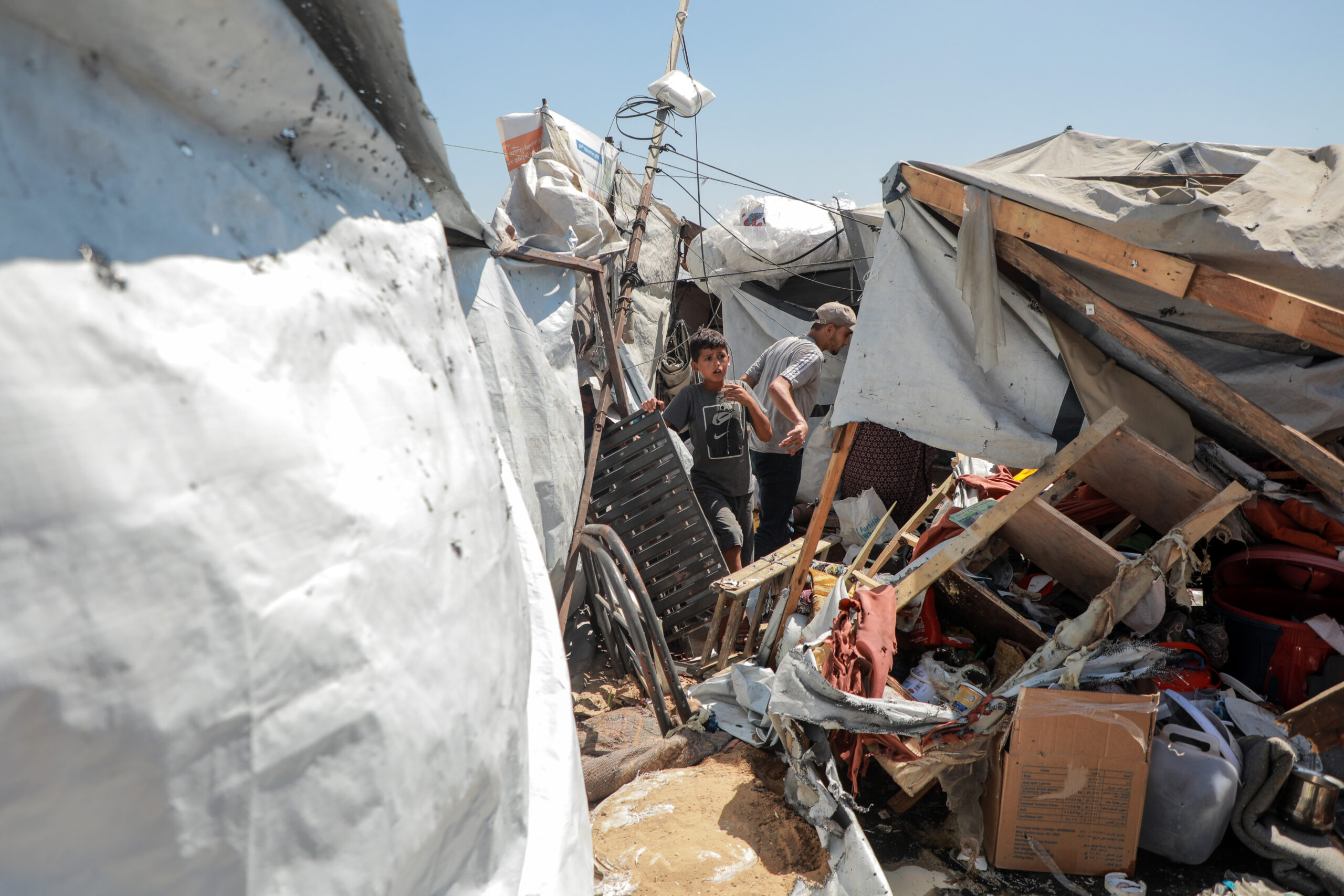 Gaza: Palestinians inspect a damaged tent after it was targeted by a missile fired from an Israeli drone in the al-Rimal neighborhood in central Gaza, on September 14, 2026. (Photo: Xinhua via IANS)