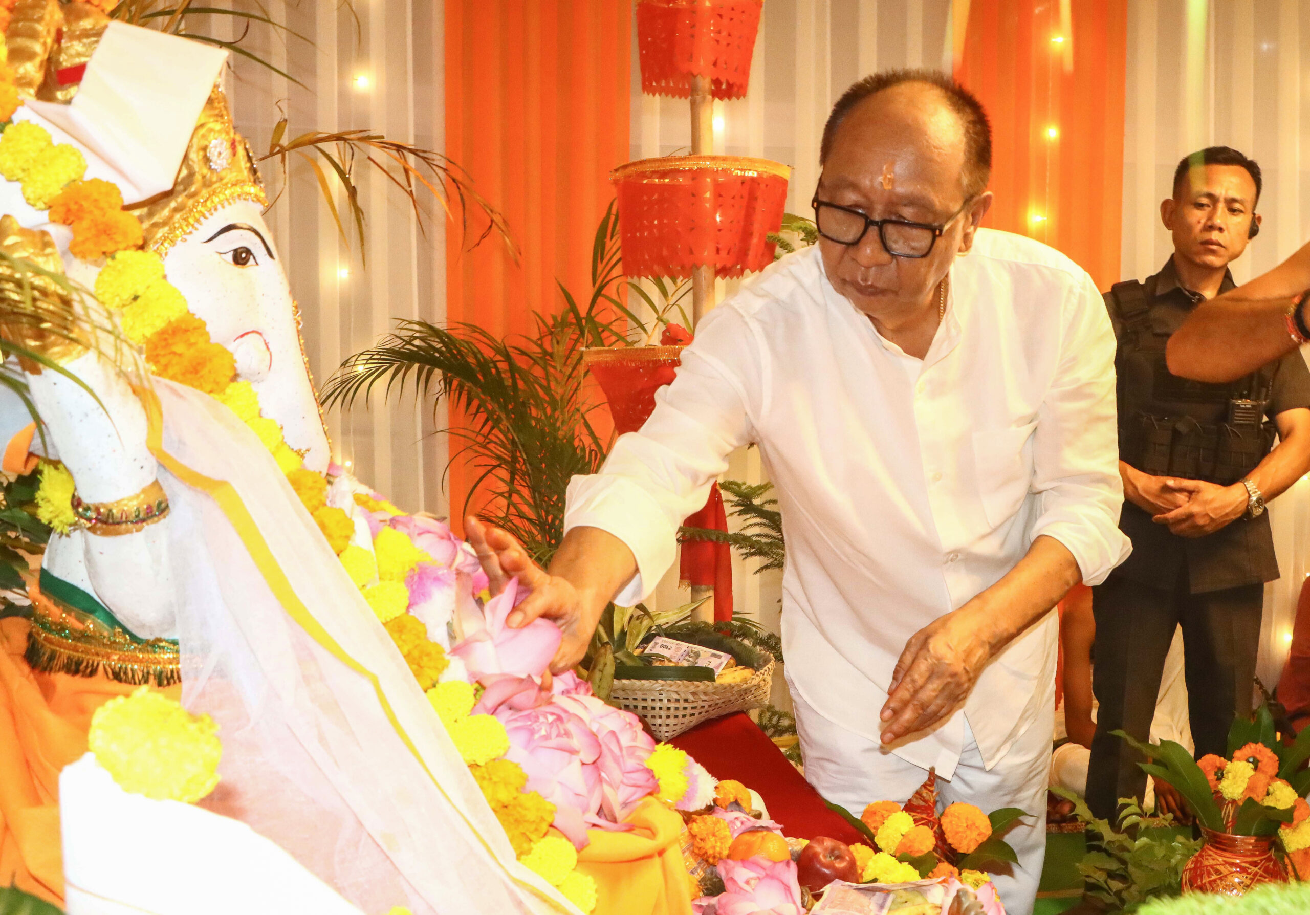 Imphal: Manipur CM Yumnam Khemchand offers prayers at Ganesh Puja celebration #Gallery Imphal: Manipur CM Yumnam Khemchand offers prayers at Ganesh Puja celebration #Gallery