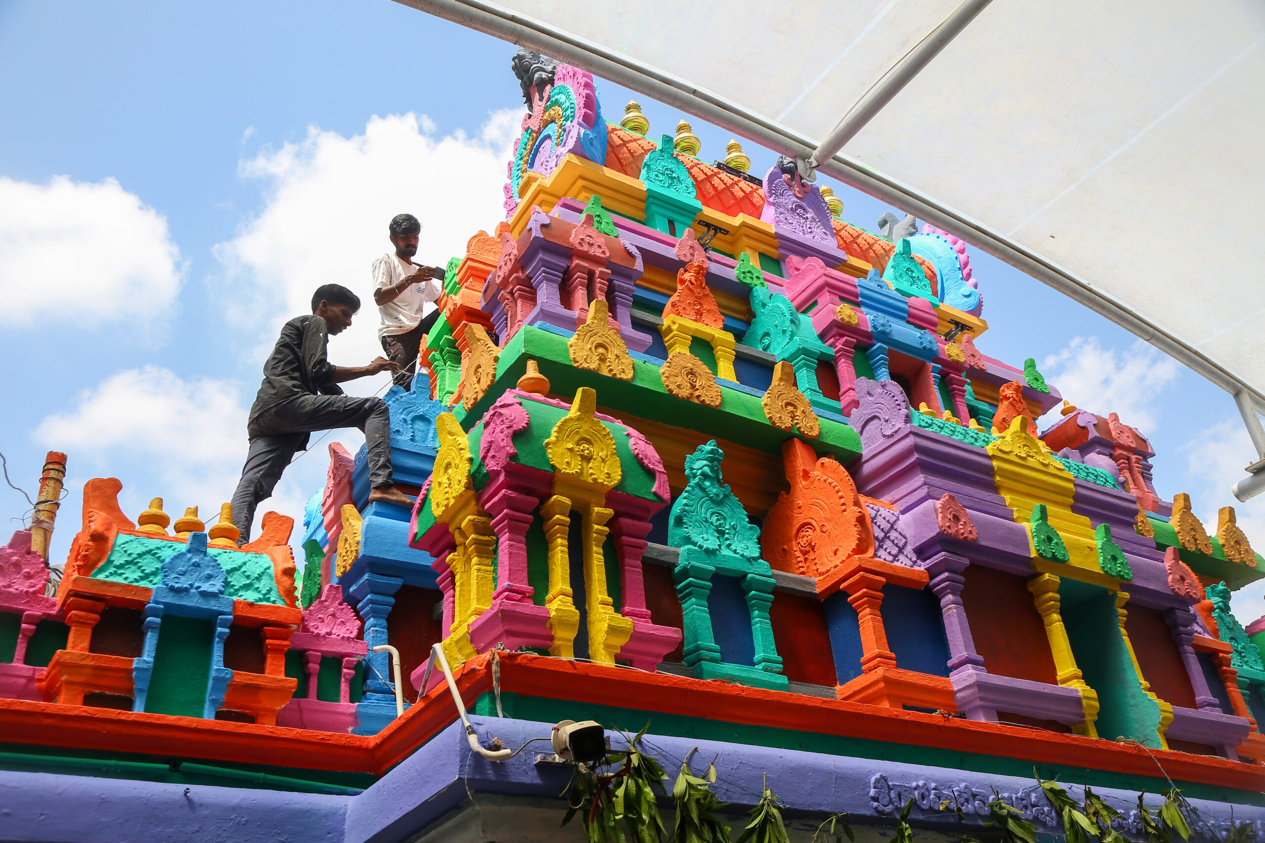 Vijayawada: Workers carry out painting work as part of Dasara festival preparations at Goddess Kanaka Durga Temple atop Indrakeeladri Hill in Vijayawada, Tuesday, September 15, 2026. (Photo: IANS)