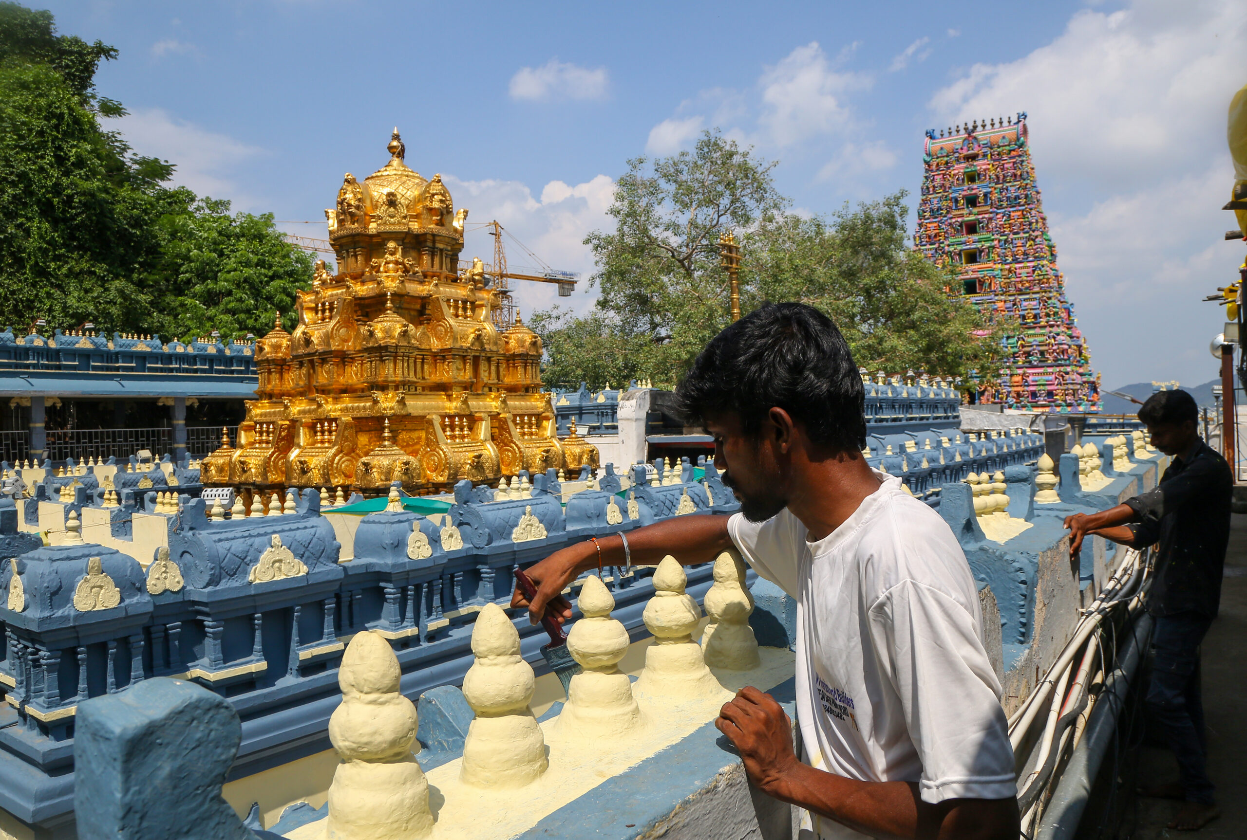 Workers Paint Kanaka Durga Temple Ahead of Dasara in Vijayawada #Gallery Workers Paint Kanaka Durga Temple Ahead of Dasara in Vijayawada #Gallery