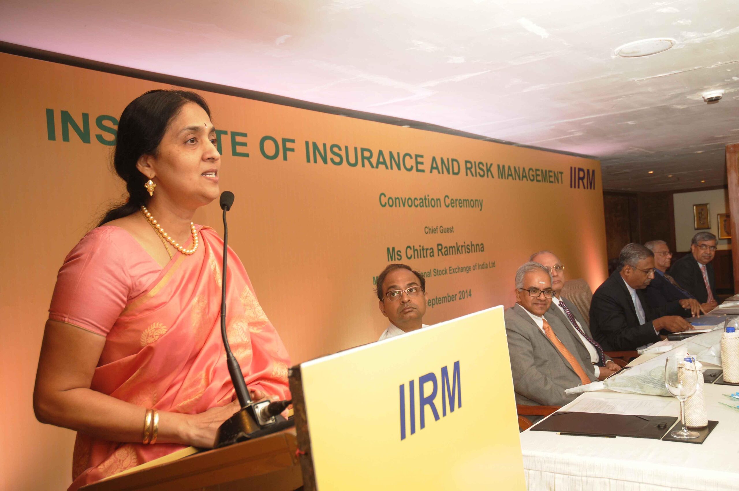 MD and CEO of NSE Chitra Ramkrishna addresses during a programme organised by Institute of Insurance and Risk Management (IIRM) in Hyderabad on Sept 3, 2014. (Photo: IANS)