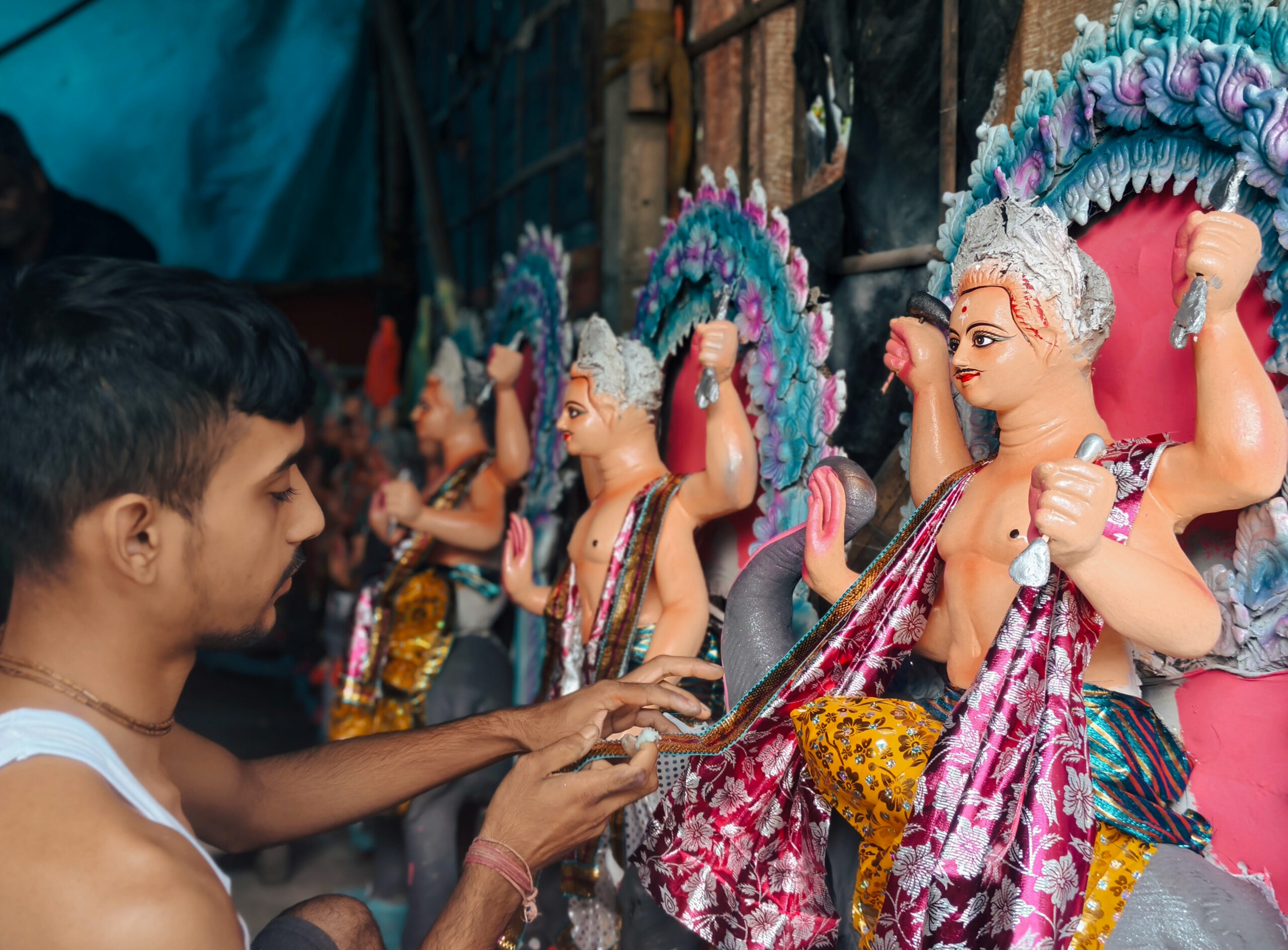 Jalpaiguri: An artist works on idols of Lord Vishwakarma ahead of Vishwakarma Puja at a workshop, in Jalpaiguri, West Bengal, on Wednesday, September 16, 2026. (Photo: IANS)