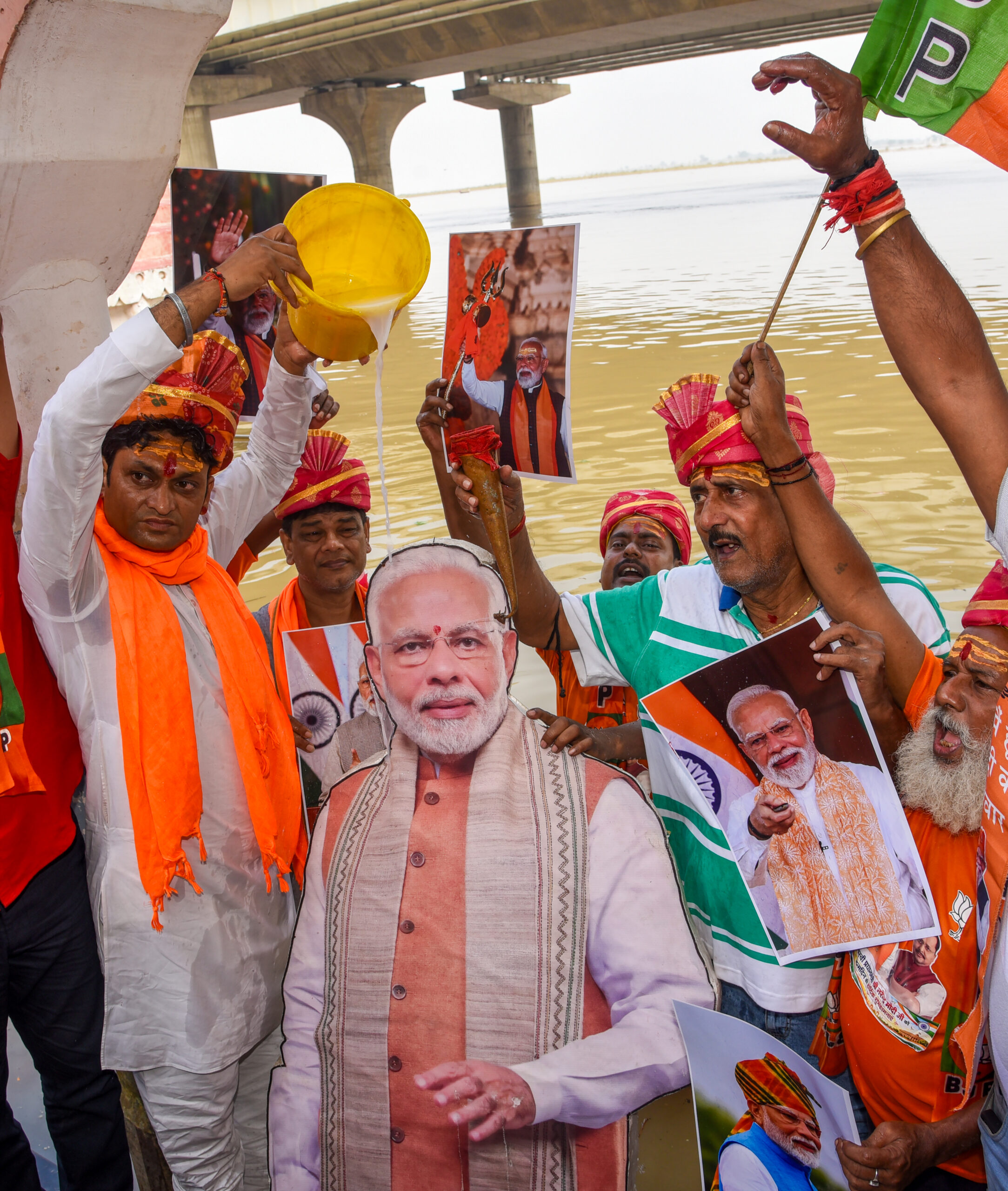 Patna: BJP supporters celebrate the birthday of Prime Minister Narendra Modi by pouring 76 kilograms of milk on his poster at Kali Ghat, on the eve of his birthday celebrations, in Patna, Bihar, on Wednesday, September 16, 2026. (Photo: IANS)