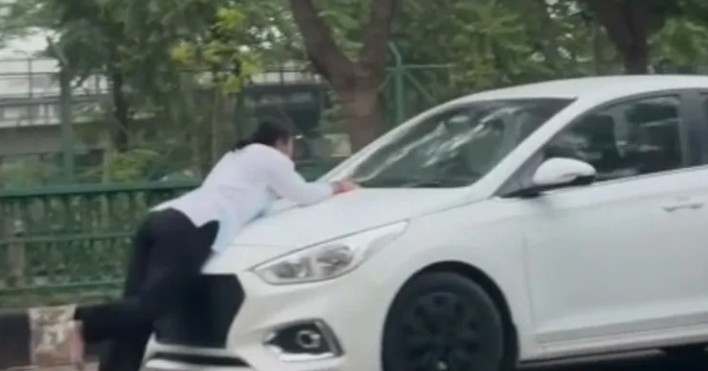 'Boyfriend' drags woman on car bonnet in Lucknow 'Boyfriend' drags woman on car bonnet in Lucknow