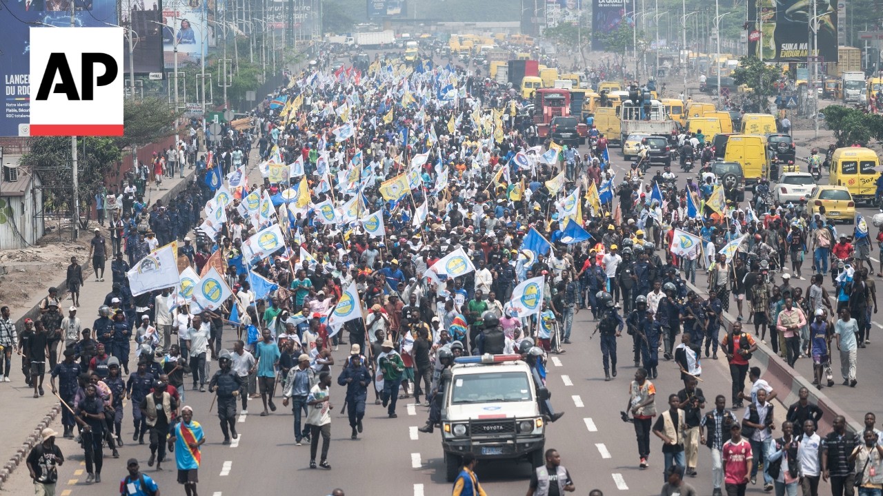 Congo police fire tear gas to break up protests against constitutional changes (Video) Congo police fire tear gas to break up protests against constitutional changes (Video)