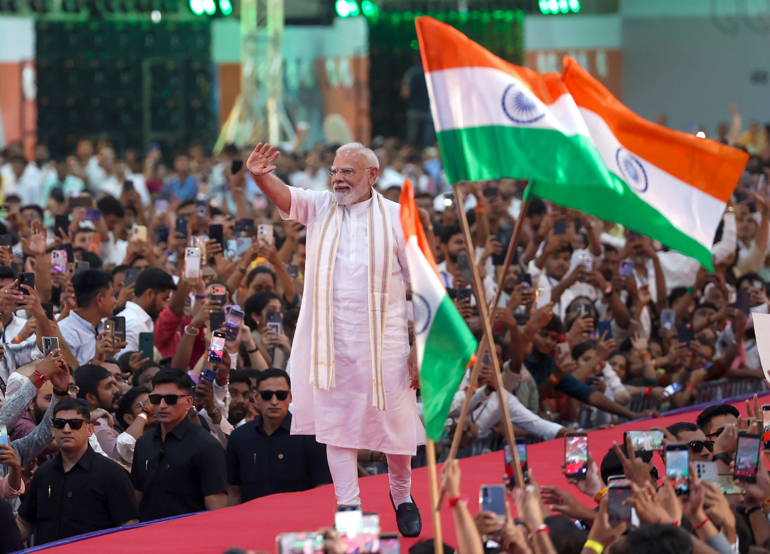 Vadodara: Prime Minister Narendra Modi waves towards the supporters during the 'Namo Viksit Bharat Programme' in Vadodara, Gujarat, on Tuesday, September 08, 2026. (Photo: IANS/PMO)