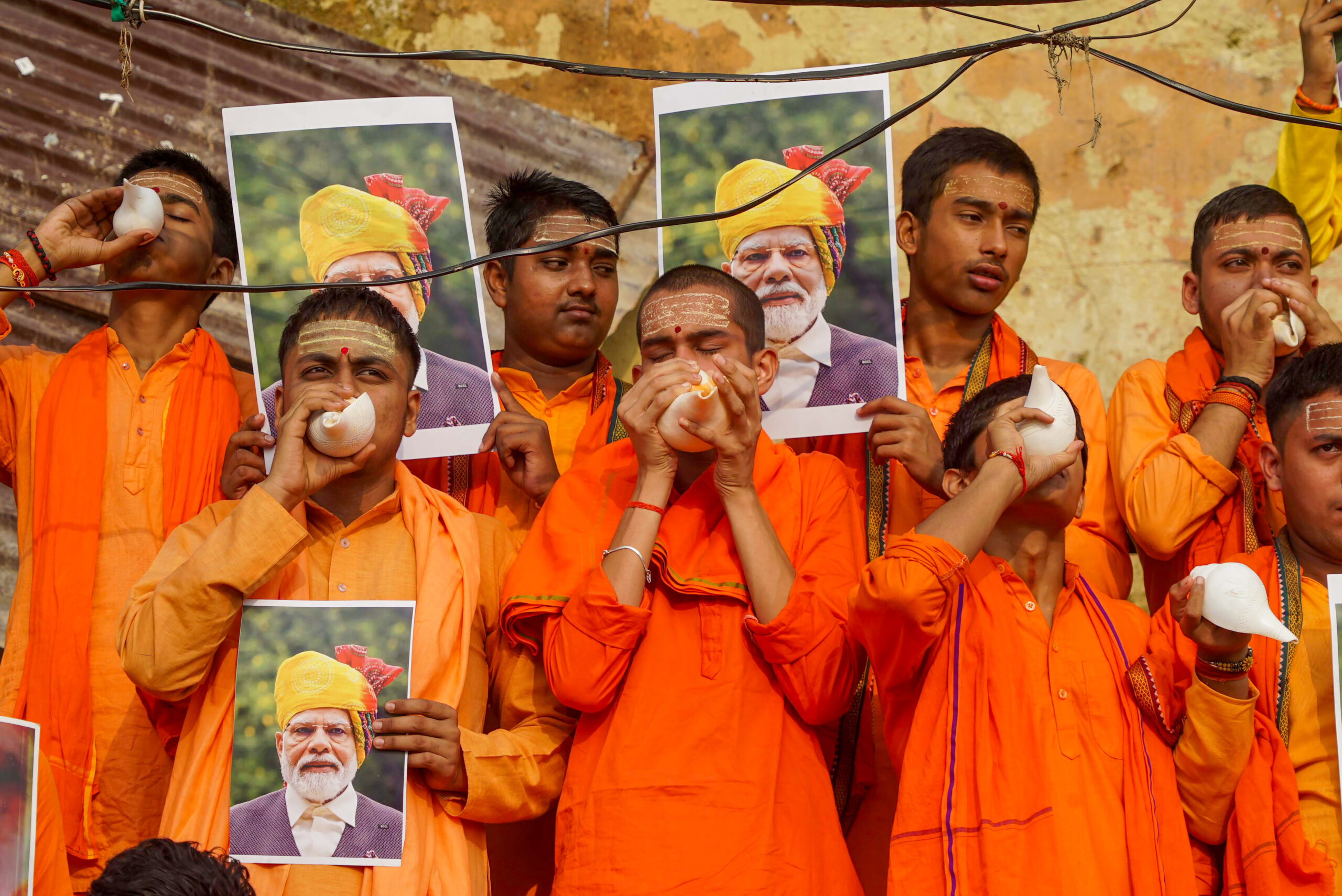 Varanasi: Batuks perform Ganga Puja on PM Modi's birthday #Gallery Varanasi: Batuks perform Ganga Puja on PM Modi's birthday #Gallery