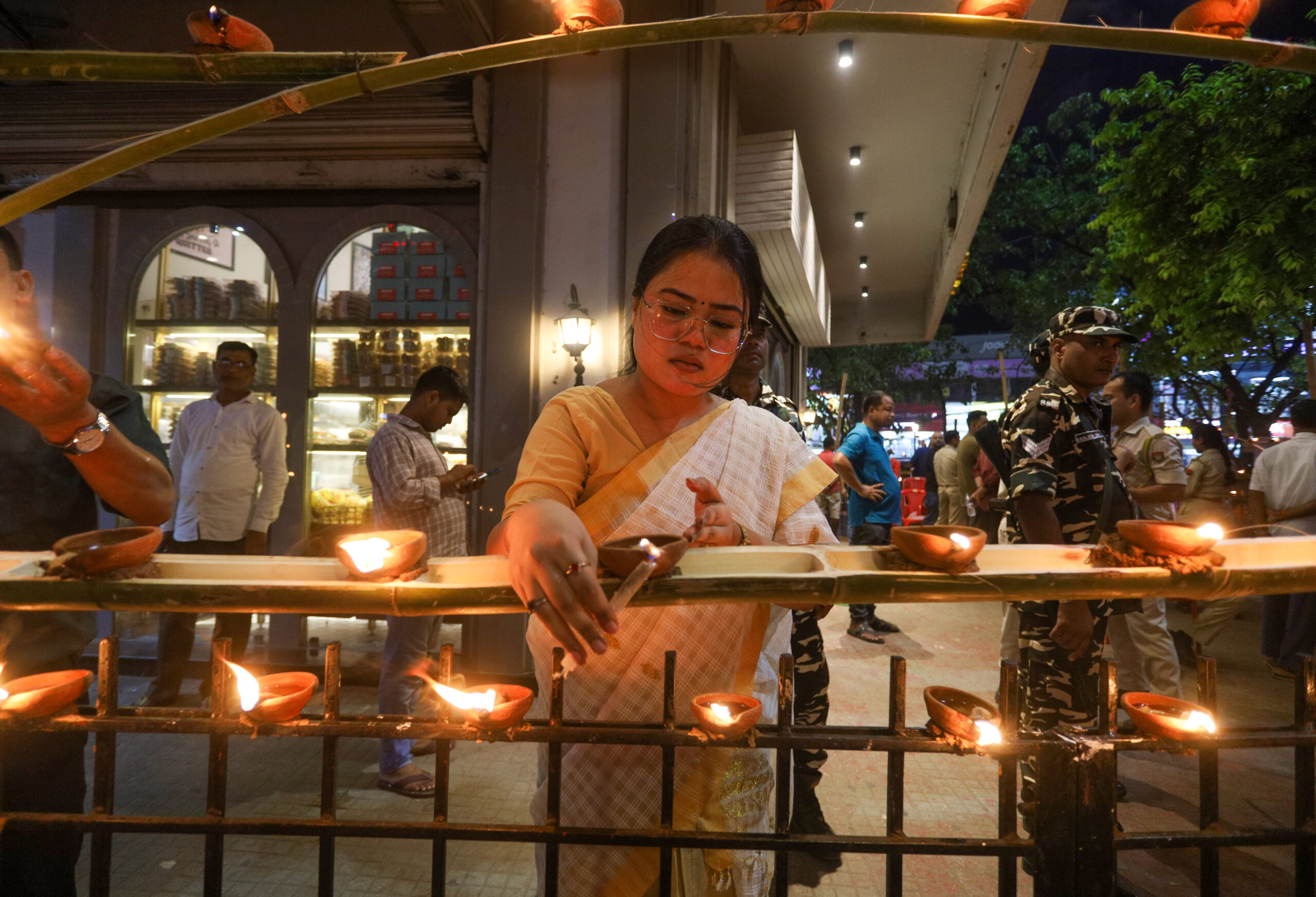 Guwahati: A BJP worker lights earthen lamps (Aashirwad Ka Diya) on the occasion of Prime Minister Narendra Modi’s 76th birthday at Ganeshguri in Guwahati, Assam, on Thursday, September 17, 2026. (Photo: IANS)