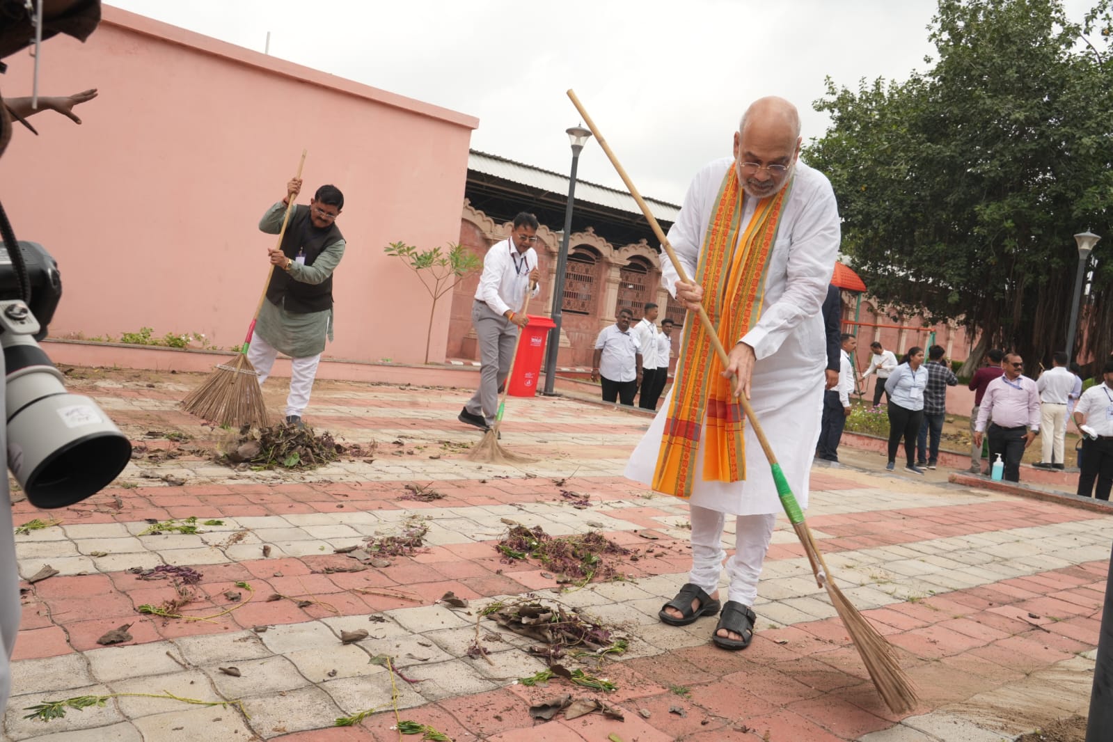 76 saplings with children, a cleanliness drive: HM Shah marks PM Modi’s birthday at Vadnagar 76 saplings with children, a cleanliness drive: HM Shah marks PM Modi’s birthday at Vadnagar