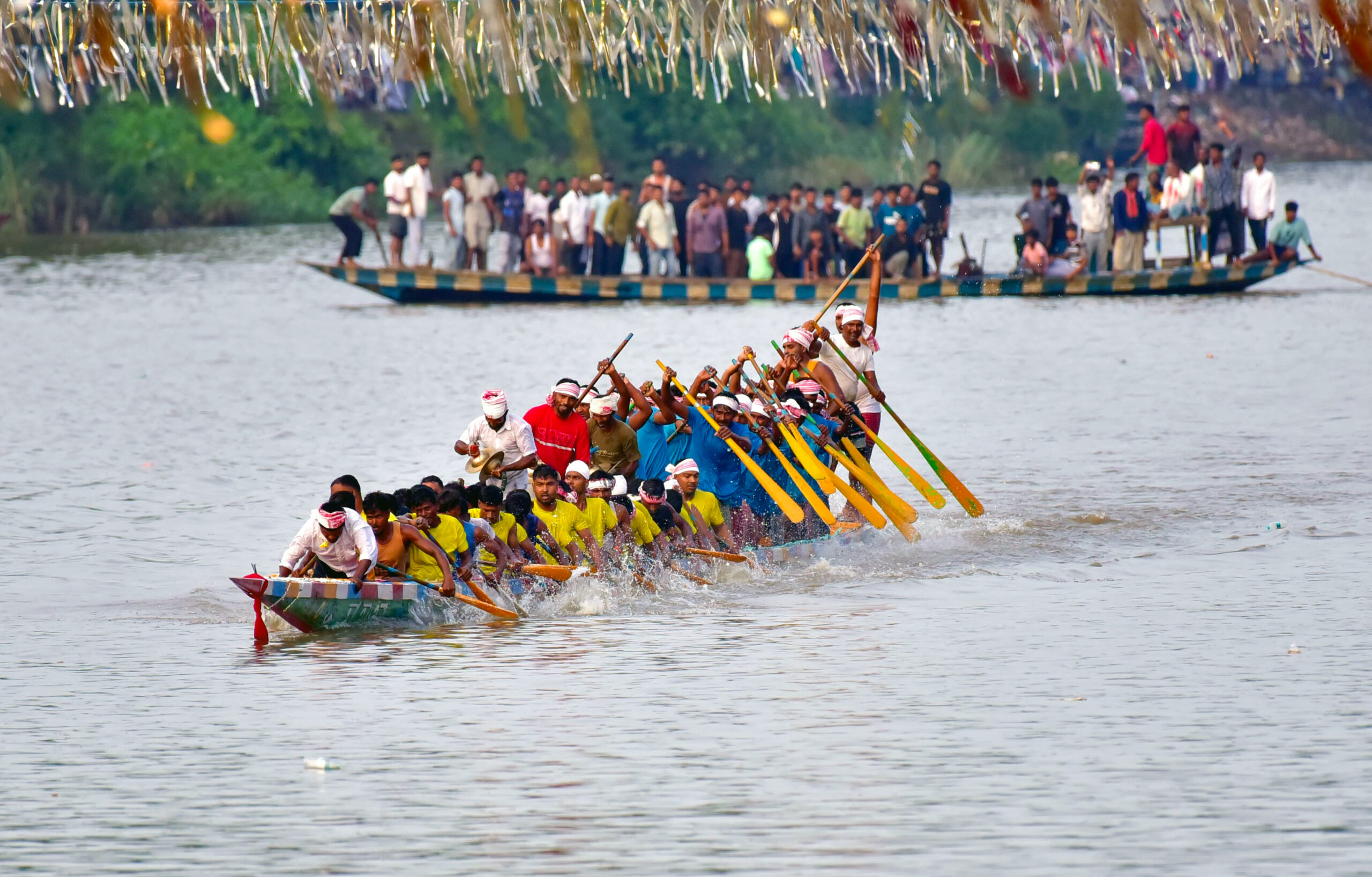 Kamrup: Traditional boat race held on Kolohi River #Gallery Kamrup: Traditional boat race held on Kolohi River #Gallery