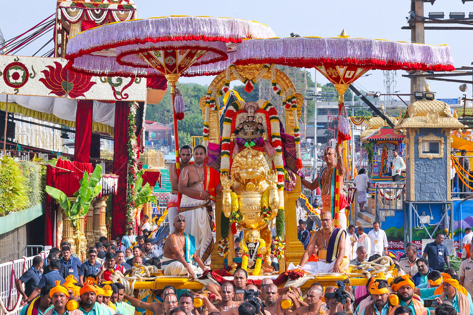 Tirumala: Devotees carry deities during Simhavahana procession #Gallery Tirumala: Devotees carry deities during Simhavahana procession #Gallery