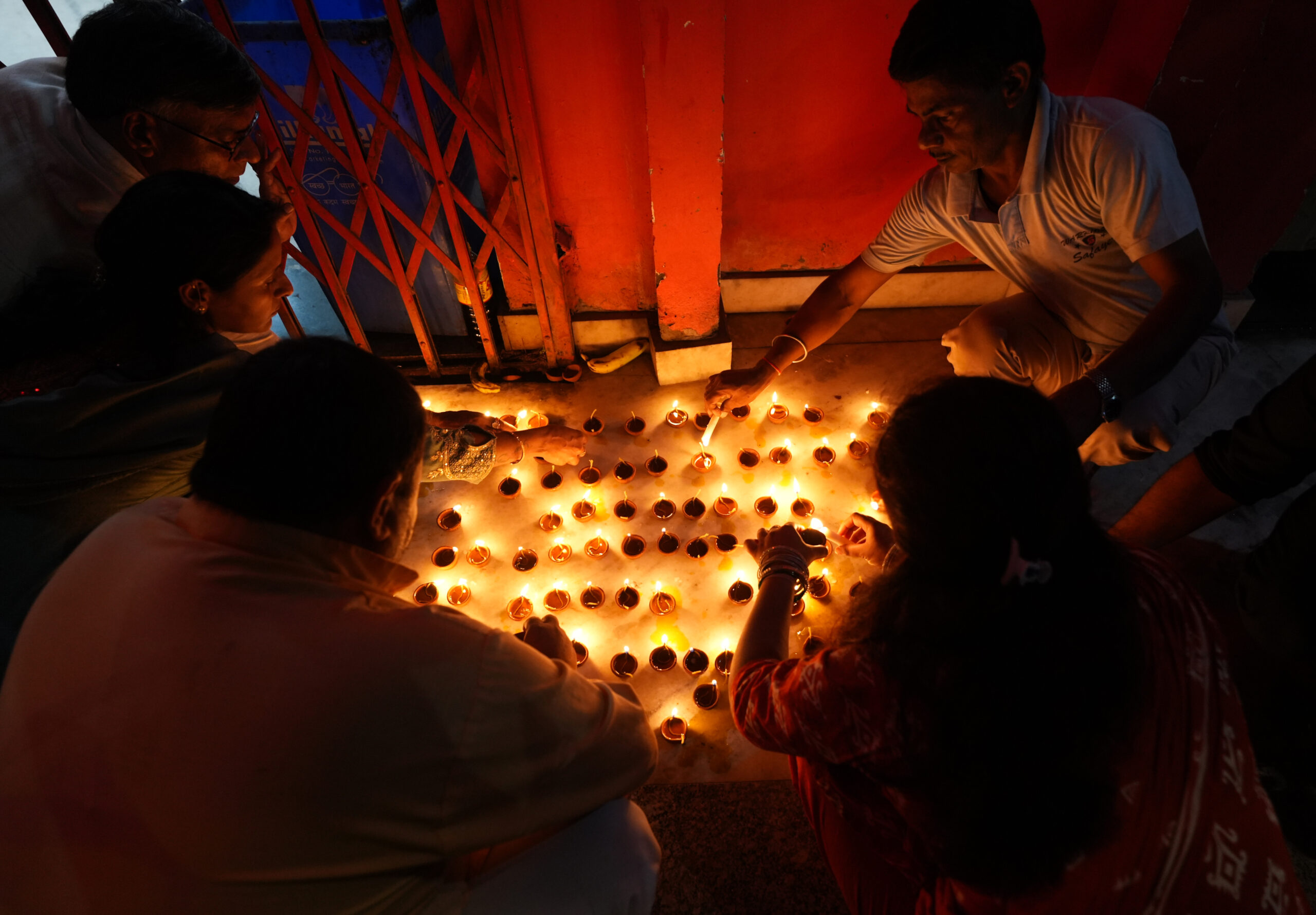 Haldwani: BJP workers light earthen lamps during the ‘Aashirwad Ka Diya’ celebrations on the occasion of Prime Minister Narendra Modi’s 76th birthday at Kalusiddh Baba Temple in Haldwani, Uttarakhand on Thursday, September 17, 2026. (Photo: IANS)