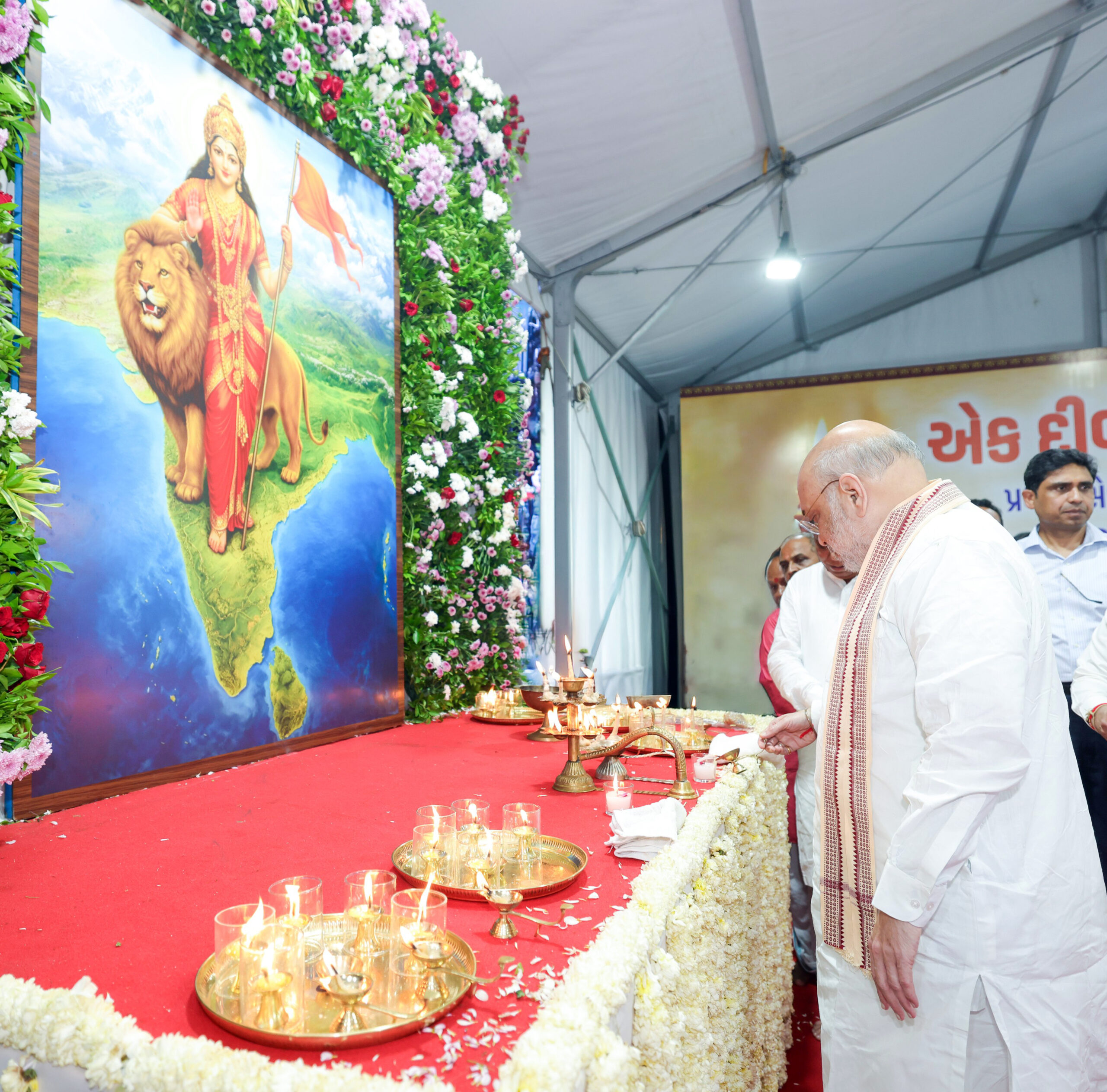 Ahmedabad: Union Home Minister Amit Shah lights an ‘Aashirwad Ka Diya’ at Kankaria Lake premises as part of the ‘Seva Sankalp Abhiyan’ on the occasion of Prime Minister Narendra Modi’s 76th birthday in Ahmedabad, Gujarat, on Thursday, September 17, 2026. (Photo: IANS/X/@AmitShah)
