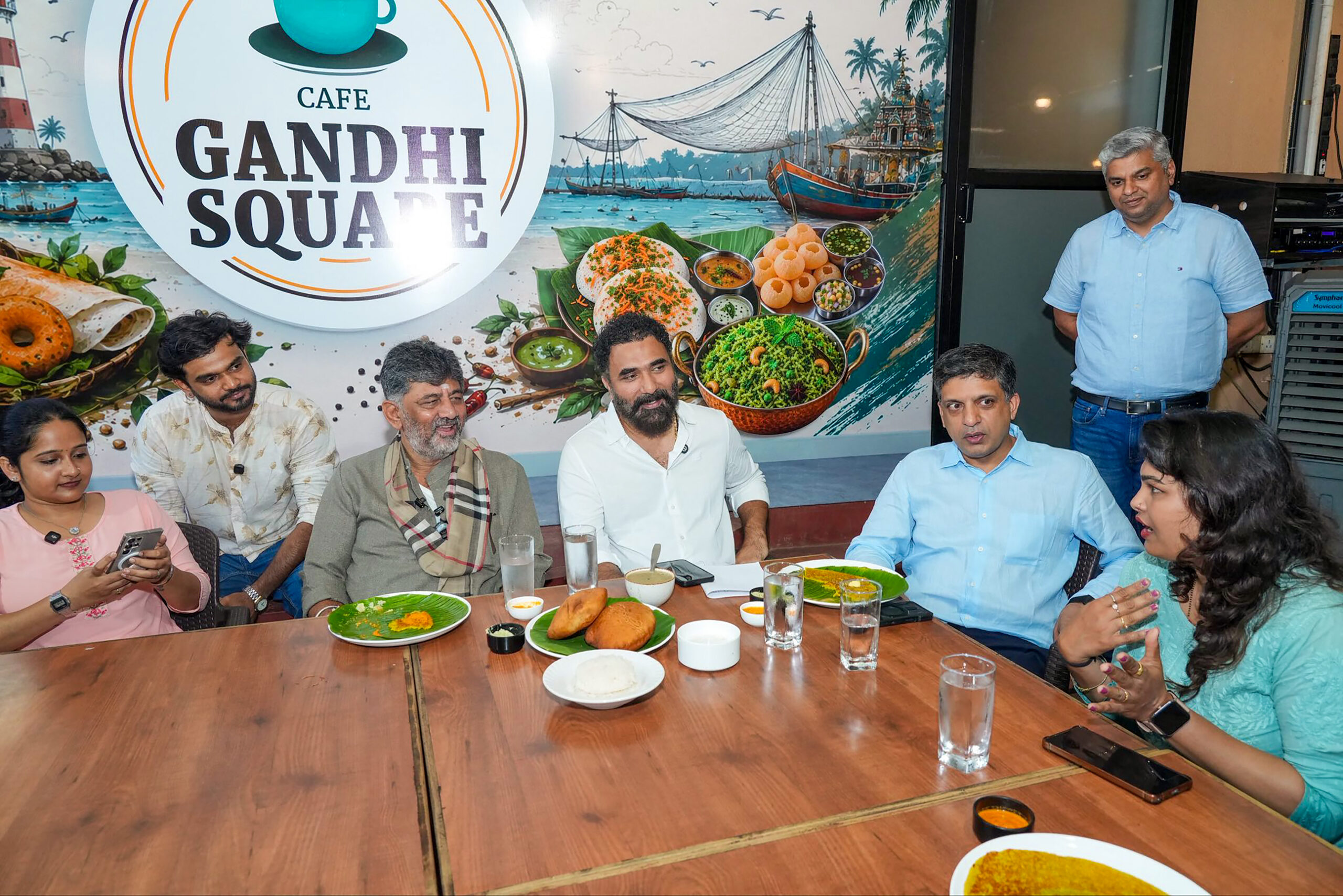 Mangaluru: Karnataka Chief Minister DK Shivakumar interacts with young creators during a visit to Gandhi Square Cafe, in Mangaluru, Karnataka, on Friday, September 18, 2026. (Photo: IANS/X/@DKShivakumar)