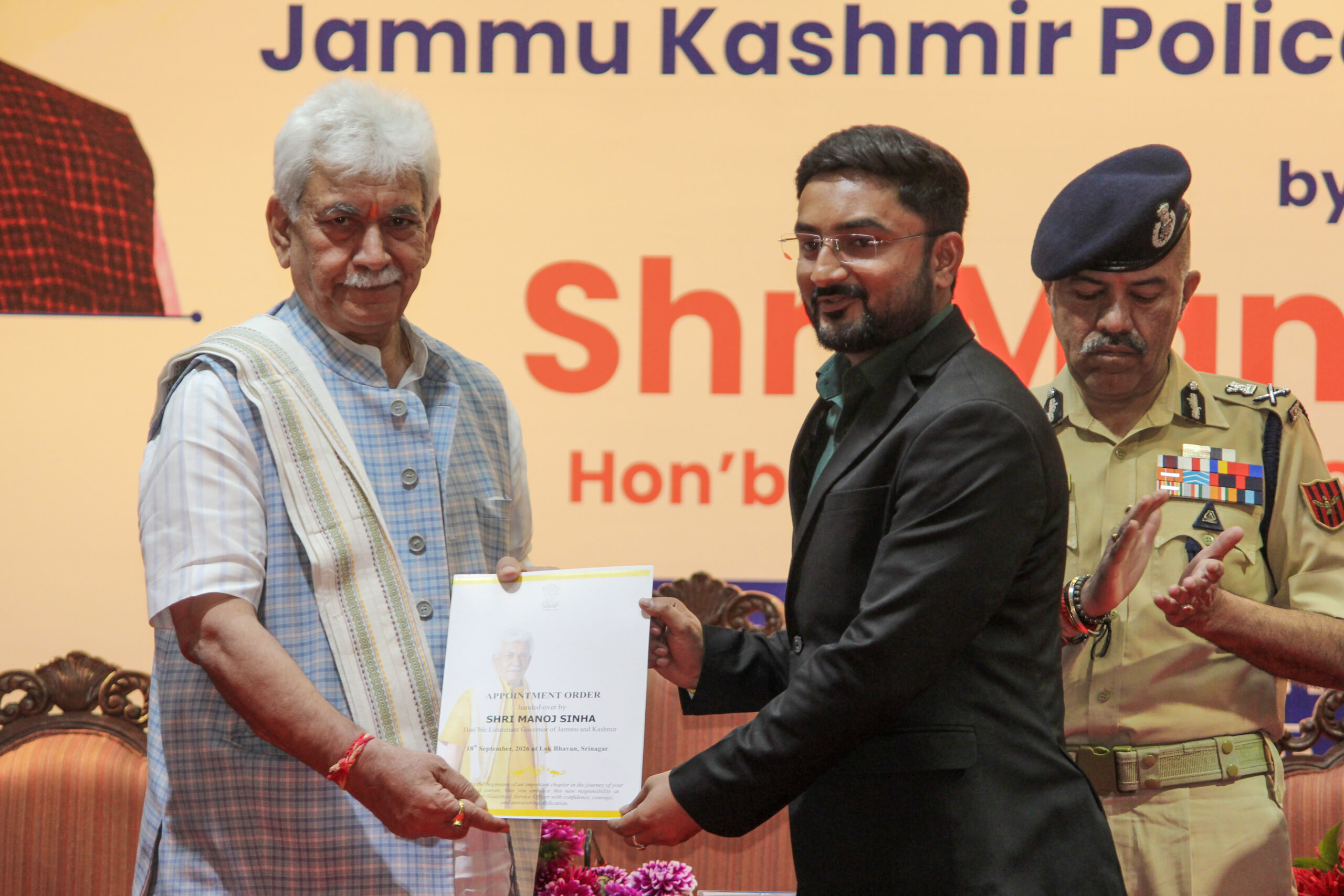 Srinagar: Jammu and Kashmir Lieutenant Governor Manoj Sinha hands over appointment orders to newly selected candidates of the Jammu and Kashmir Police (Gazetted) Services at the Lok Bhavan Auditorium in Srinagar on Friday, September 18, 2026. (Photo: IANS)