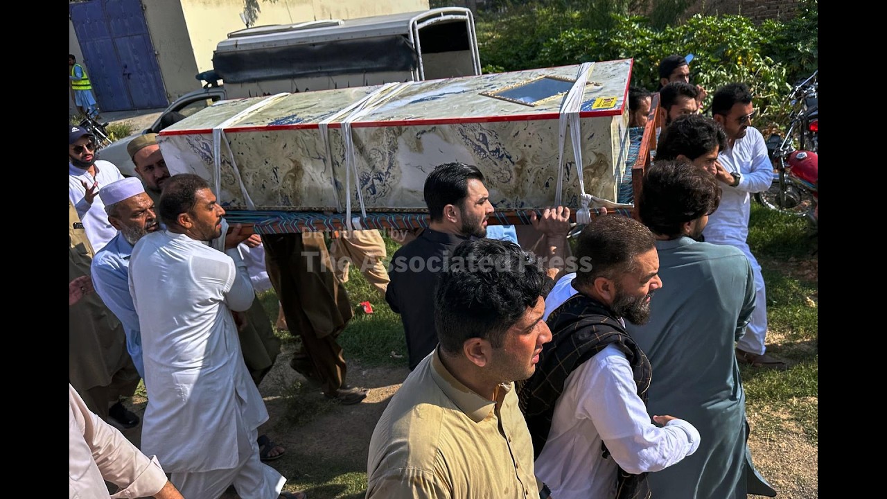Funerals held for those killed in Pakistan mosque bombing as doctors treat the injured (Video)