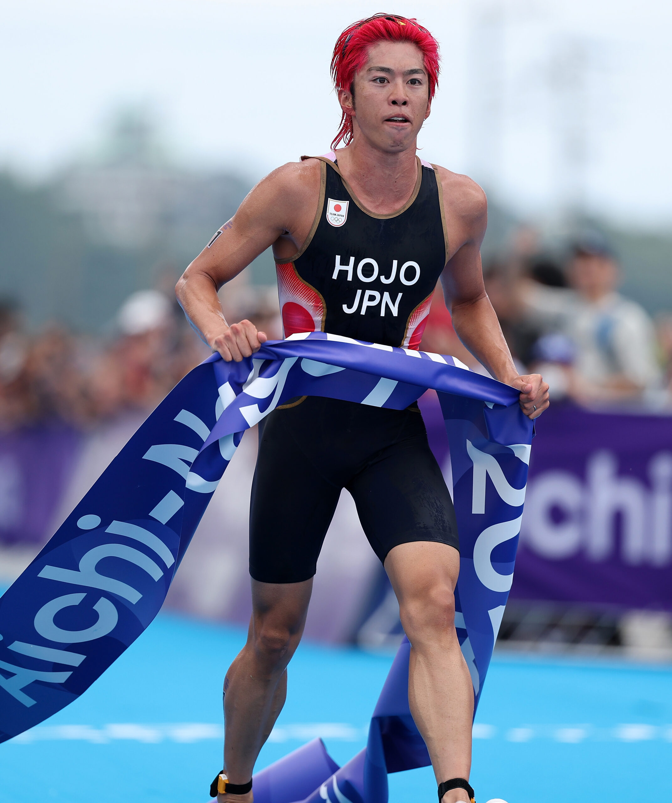 Aichi: Japan's Hojo Takumi celebrates after crossing the finish line in the men's individual triathlon at the 20th Asian Games Aichi-Nagoya 2026 in Gamagori City, Aichi Prefecture, on Sunday, September 20, 2026. (Photo: Xinhua via IANS)