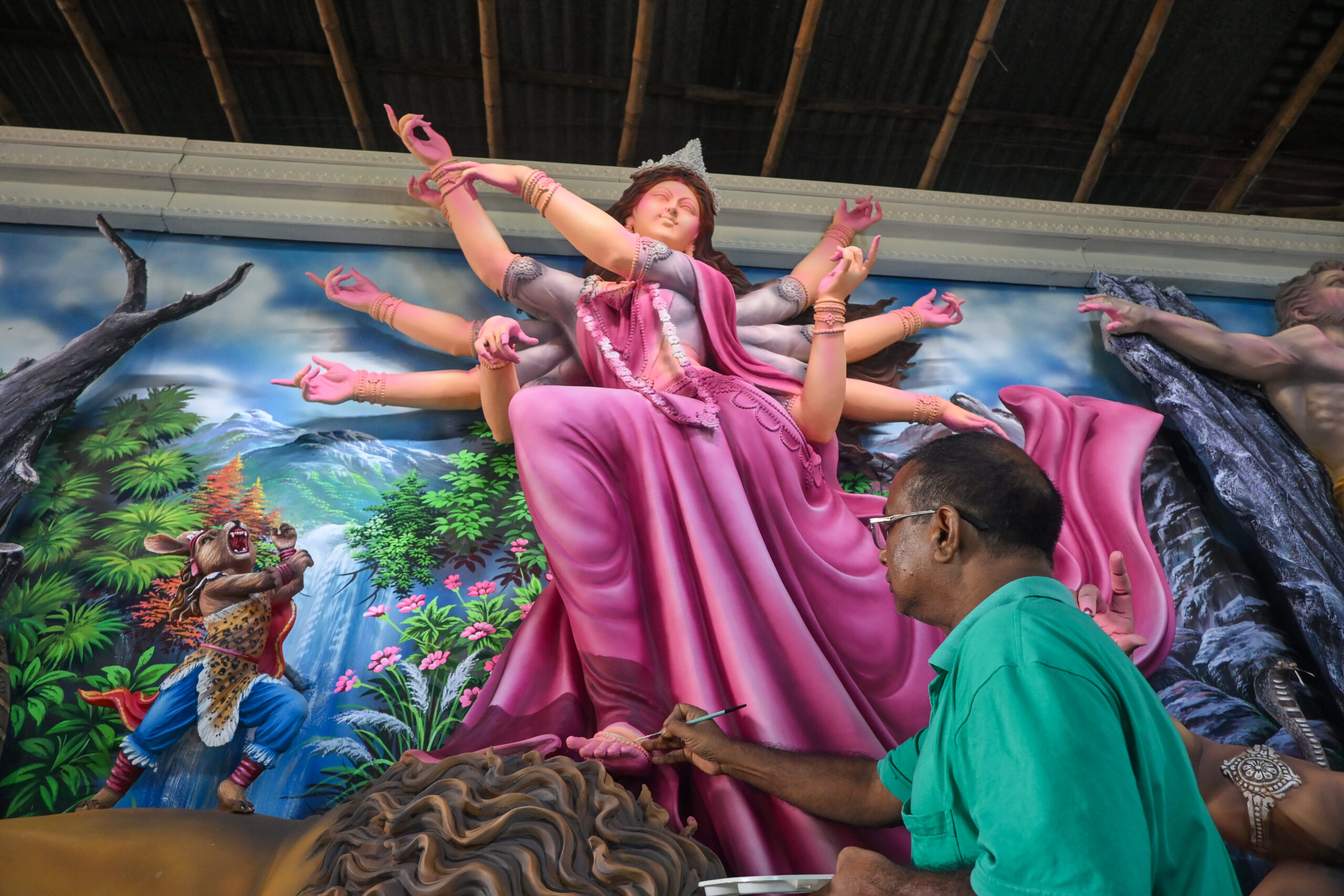 Nadia: An artist gives the finishing touch to a clay idol of Goddess Durga in his workshop as preparations for Durga Puja begin in Krishnanagar, Nadia district, West Bengal, on Sunday, September 20, 2026. (Photo: IANS)