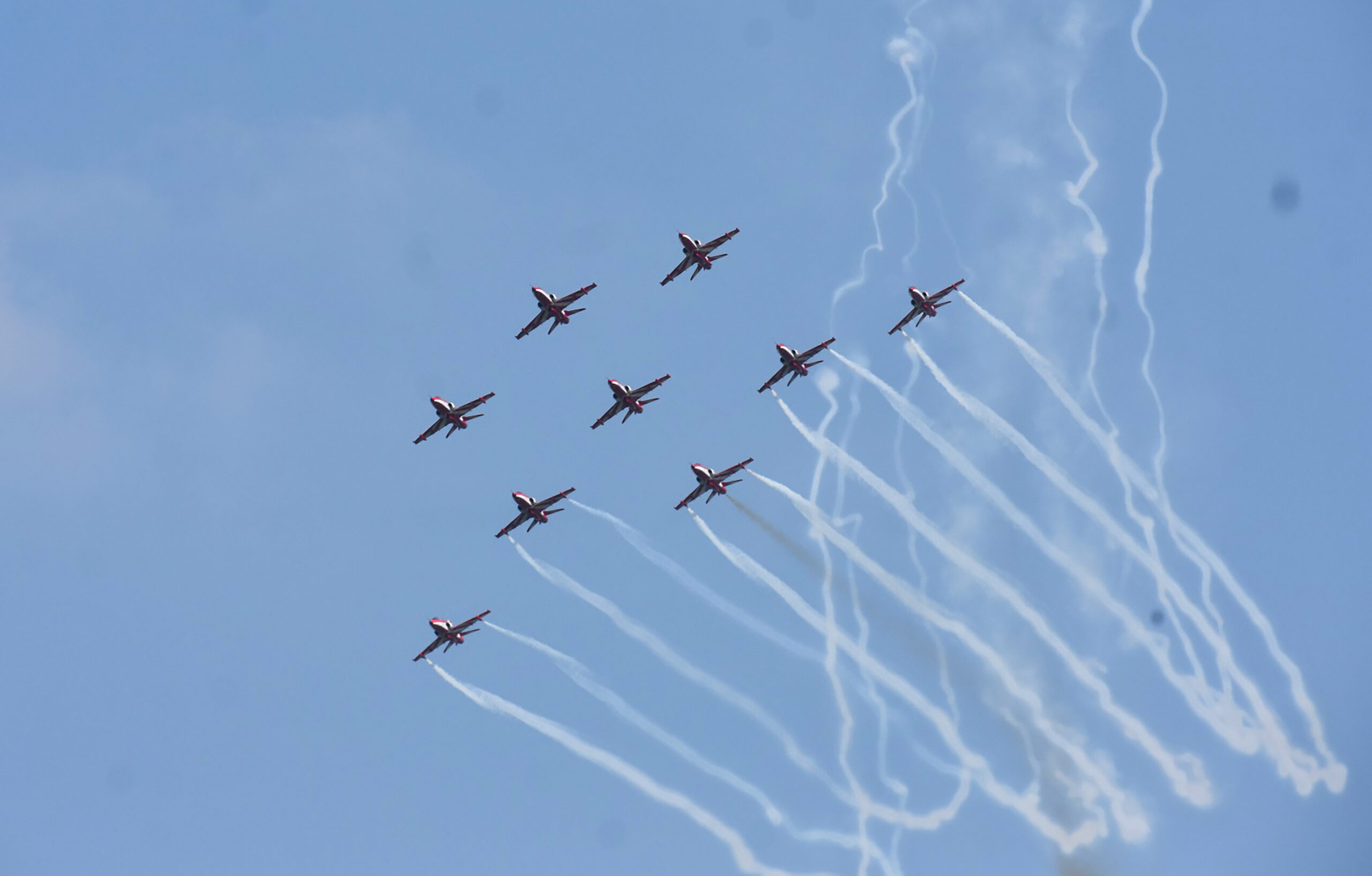 Meerut: Suryakiran Aerobatic Team performs aerial manoeuvres during air show #Gallery Meerut: Suryakiran Aerobatic Team performs aerial manoeuvres during air show #Gallery
