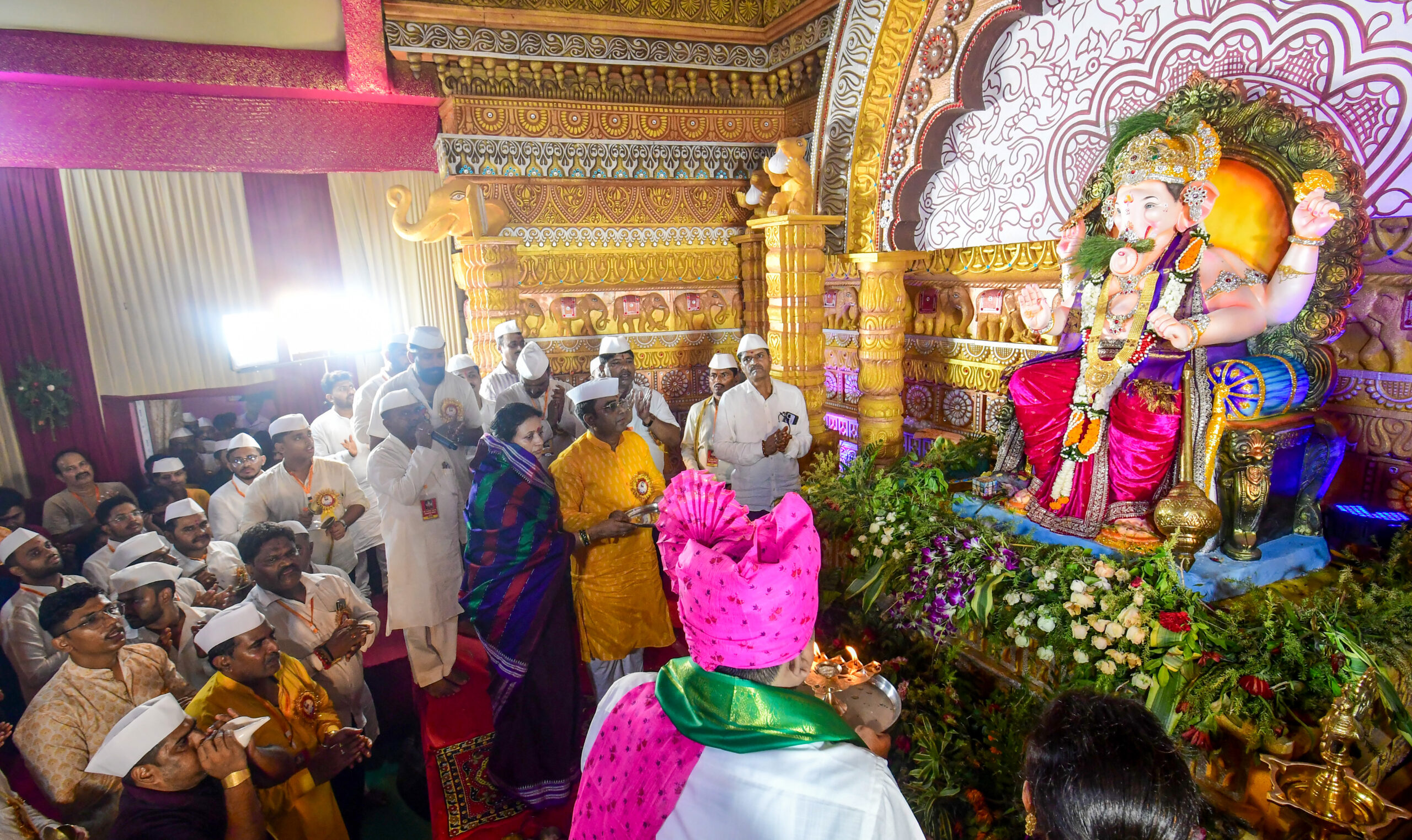 Patna: Devotees offer prayers before taking an idol of Lord Ganesha for immersion during Ganesh Visarjan, in Patna, Bihar, on Sunday, September 20, 2026. (Photo: IANS)