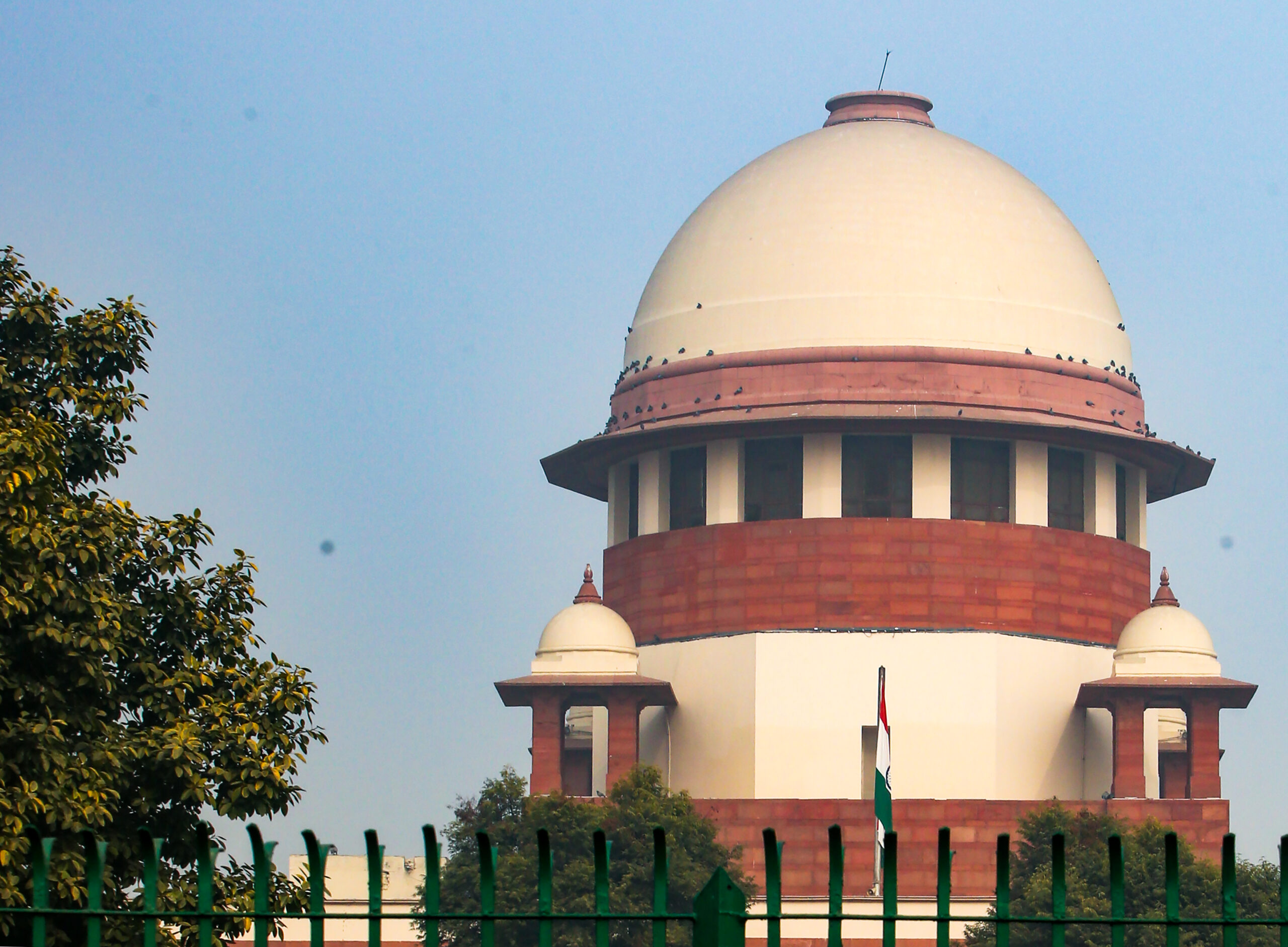New Delhi: A striking view of the Supreme Court of India standing tall under a clear sky, in New Delhi, Monday, December 29, 2025. (Photo: IANS/Prem Nath Pandey)